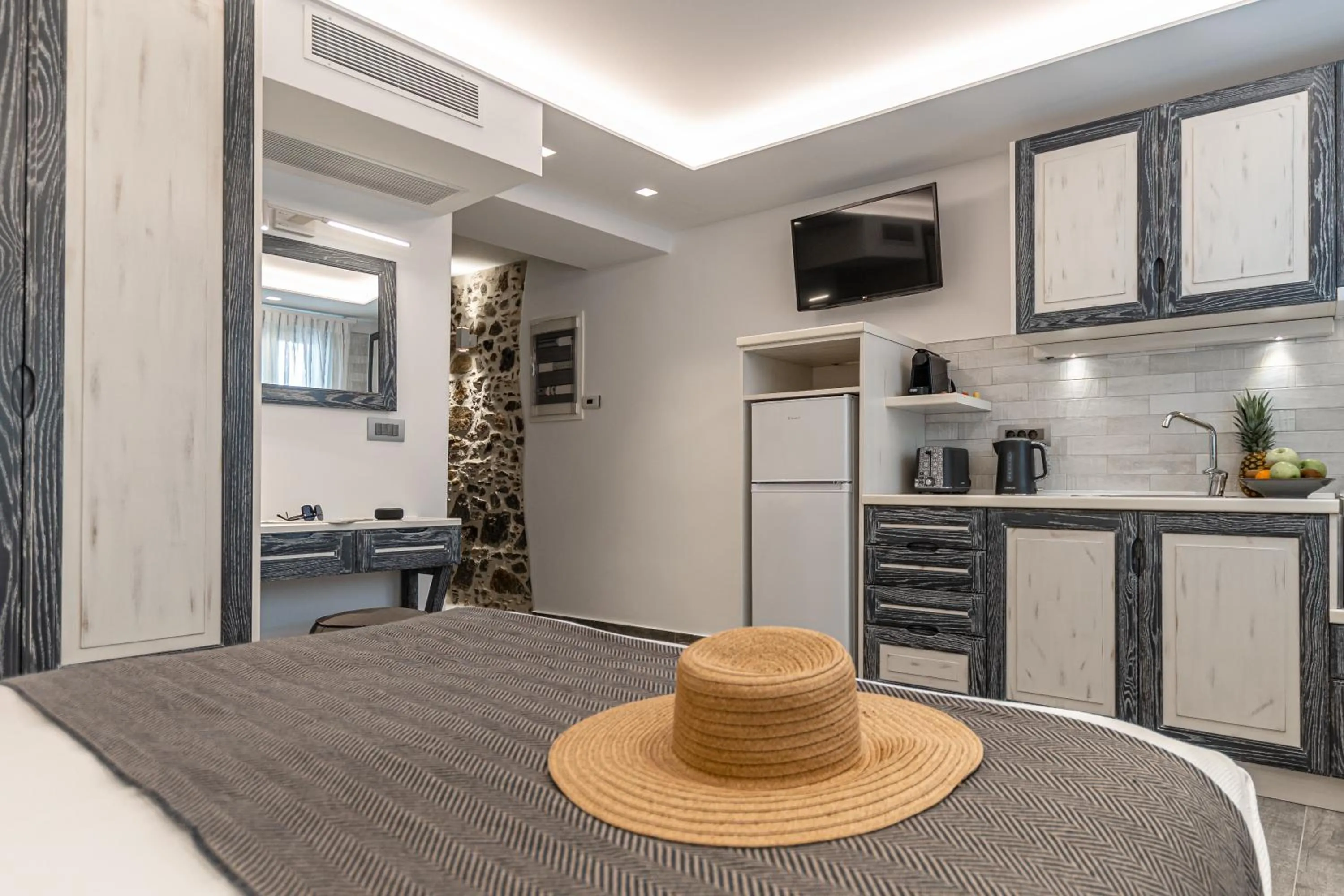 Bed in Mariet Naxos Elegant Suites