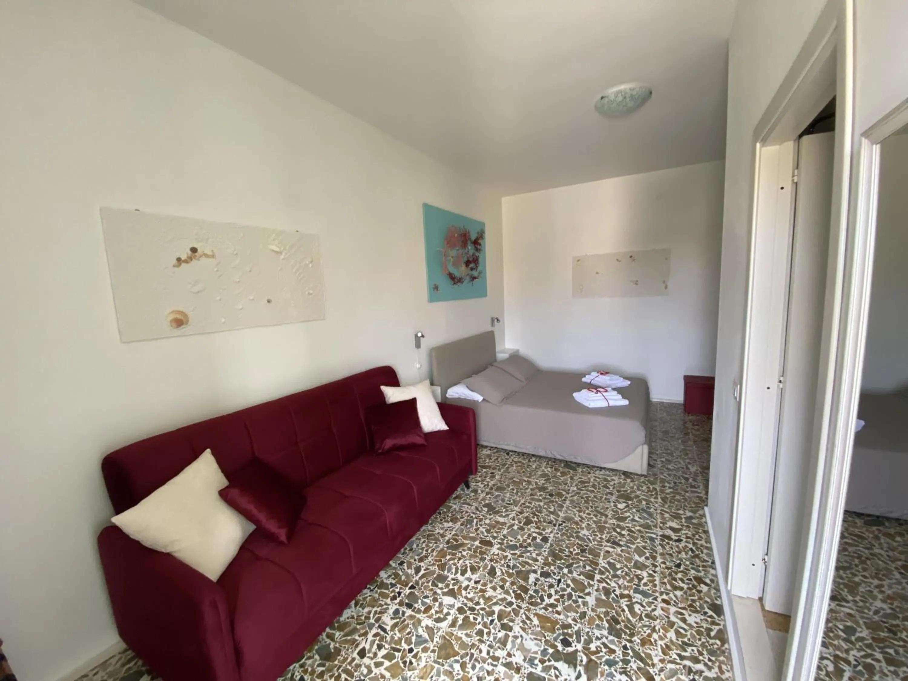 Bedroom in Rossocorallo Rooms