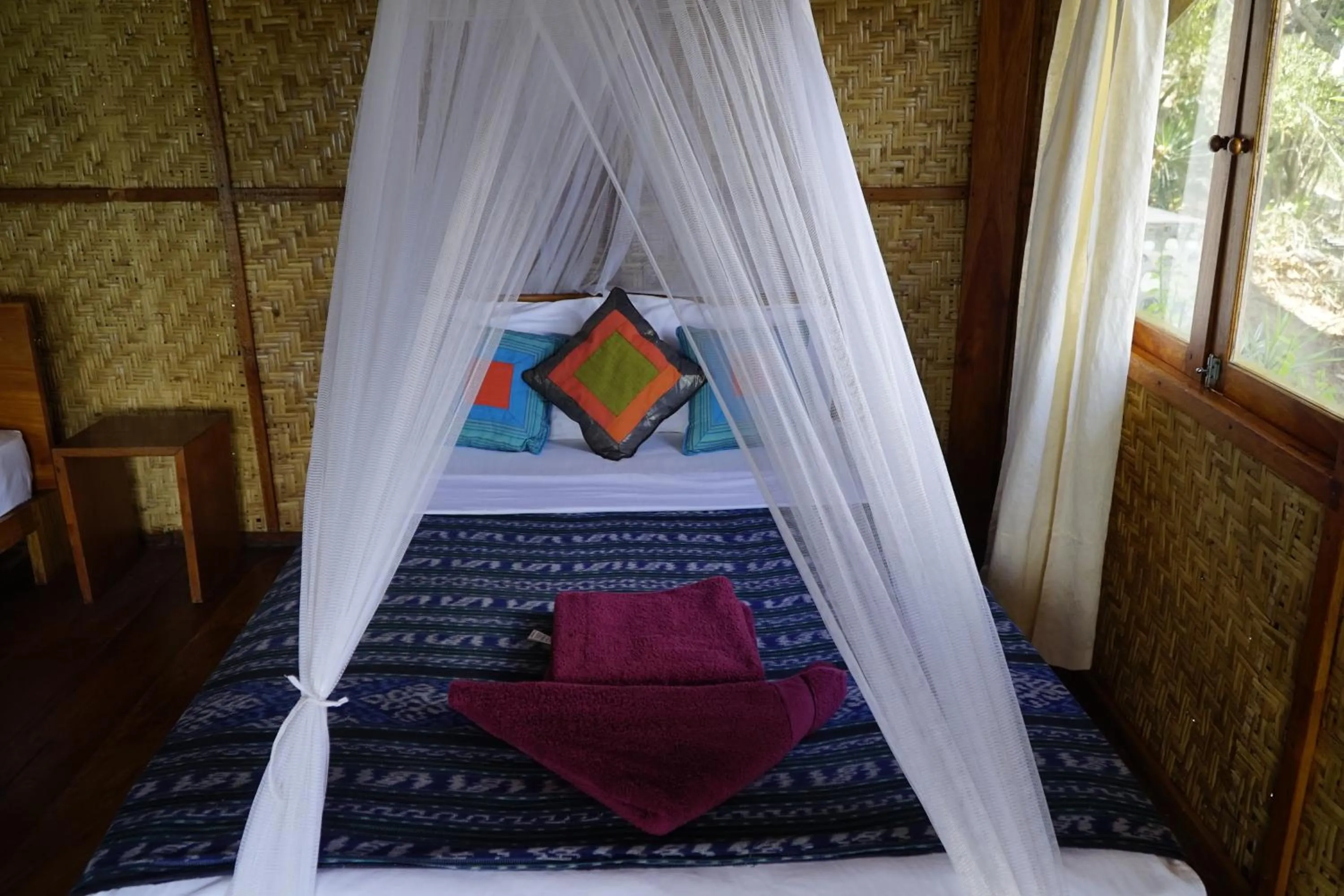 Bed in Waecicu Eden Beach Hotel