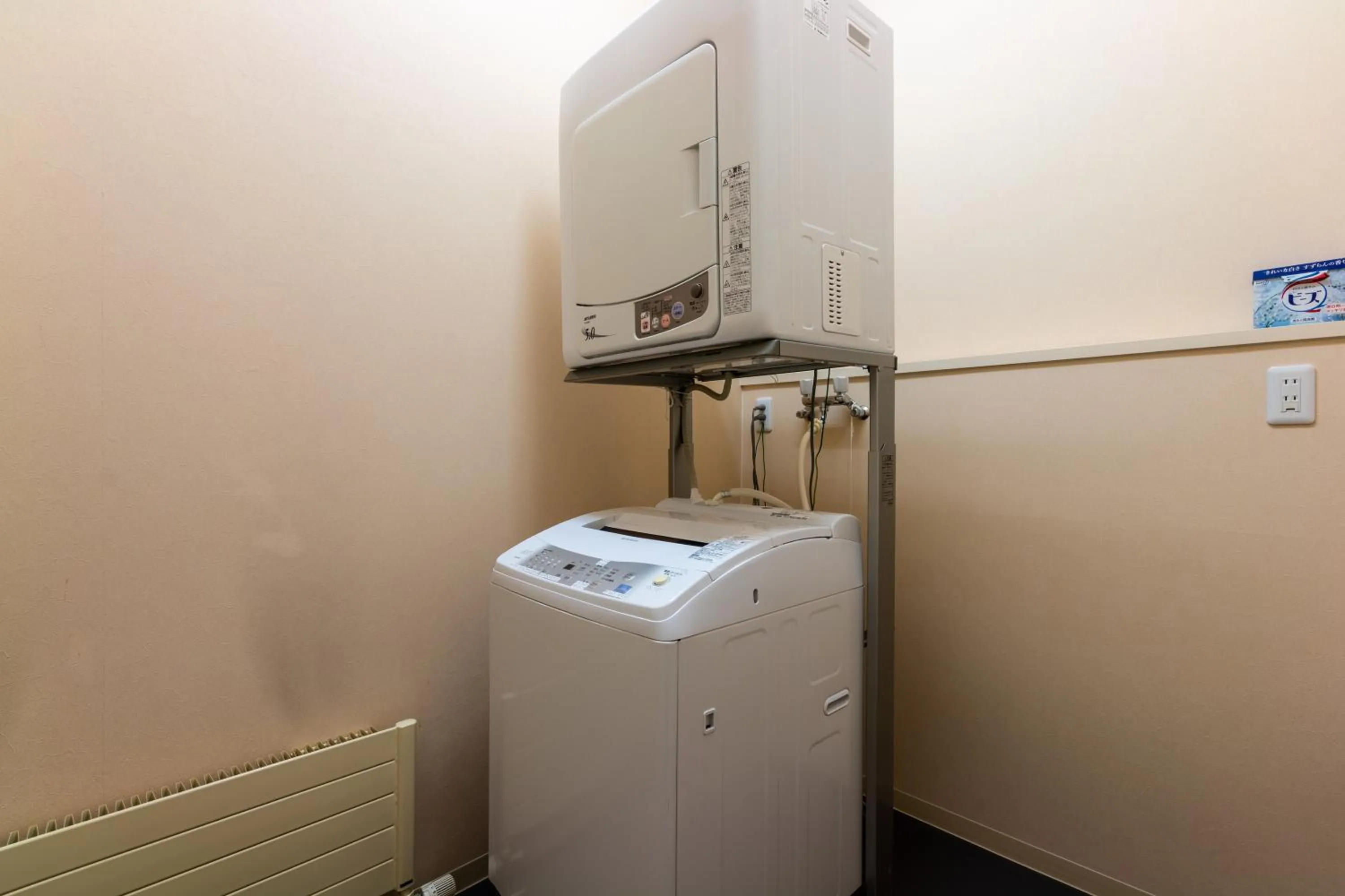 washing machine in Gondola Chalet by H2 Life