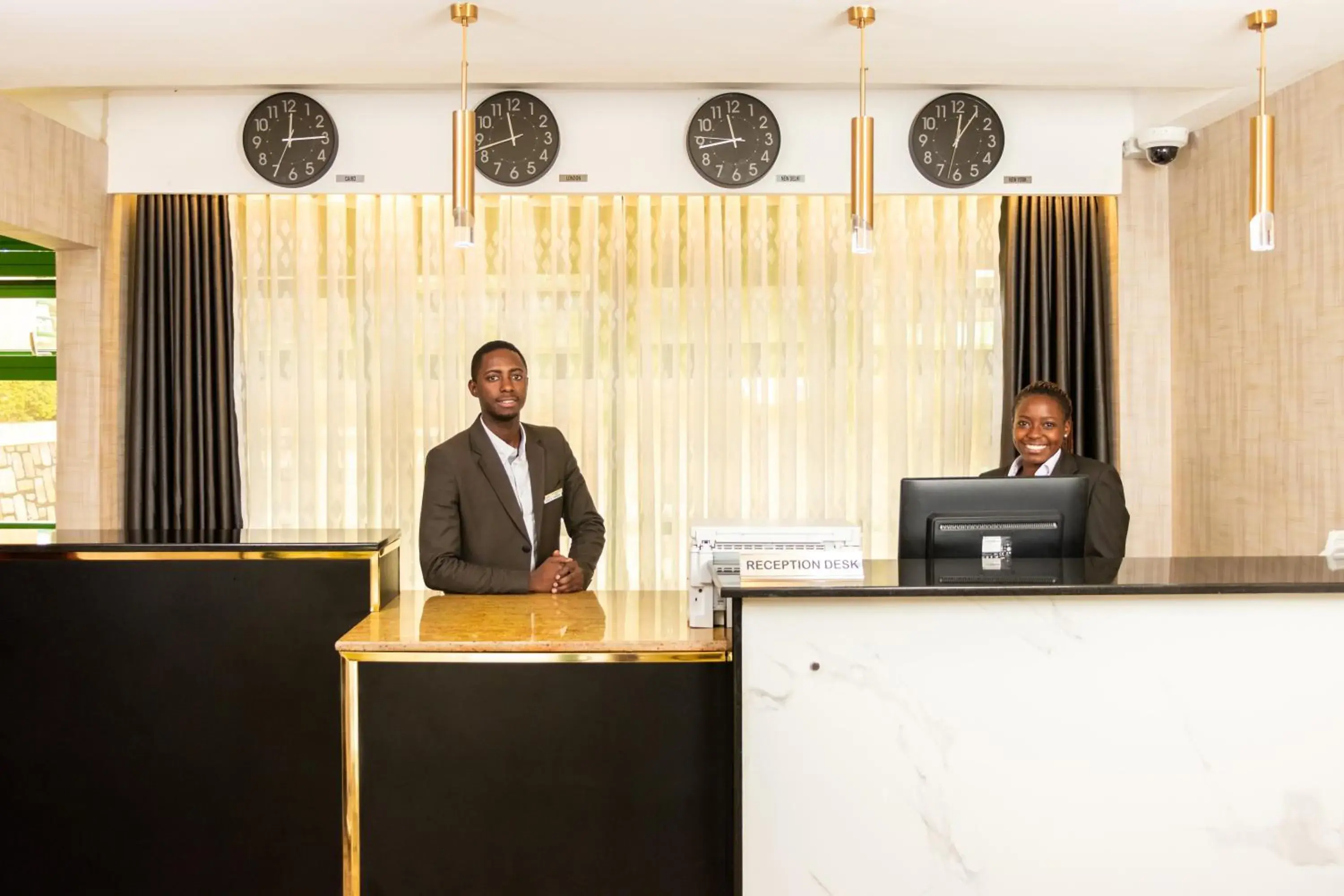 Staff in Highlands Suites Hotel and Apartments Staff in Highlands Suites Hotel and Apartments