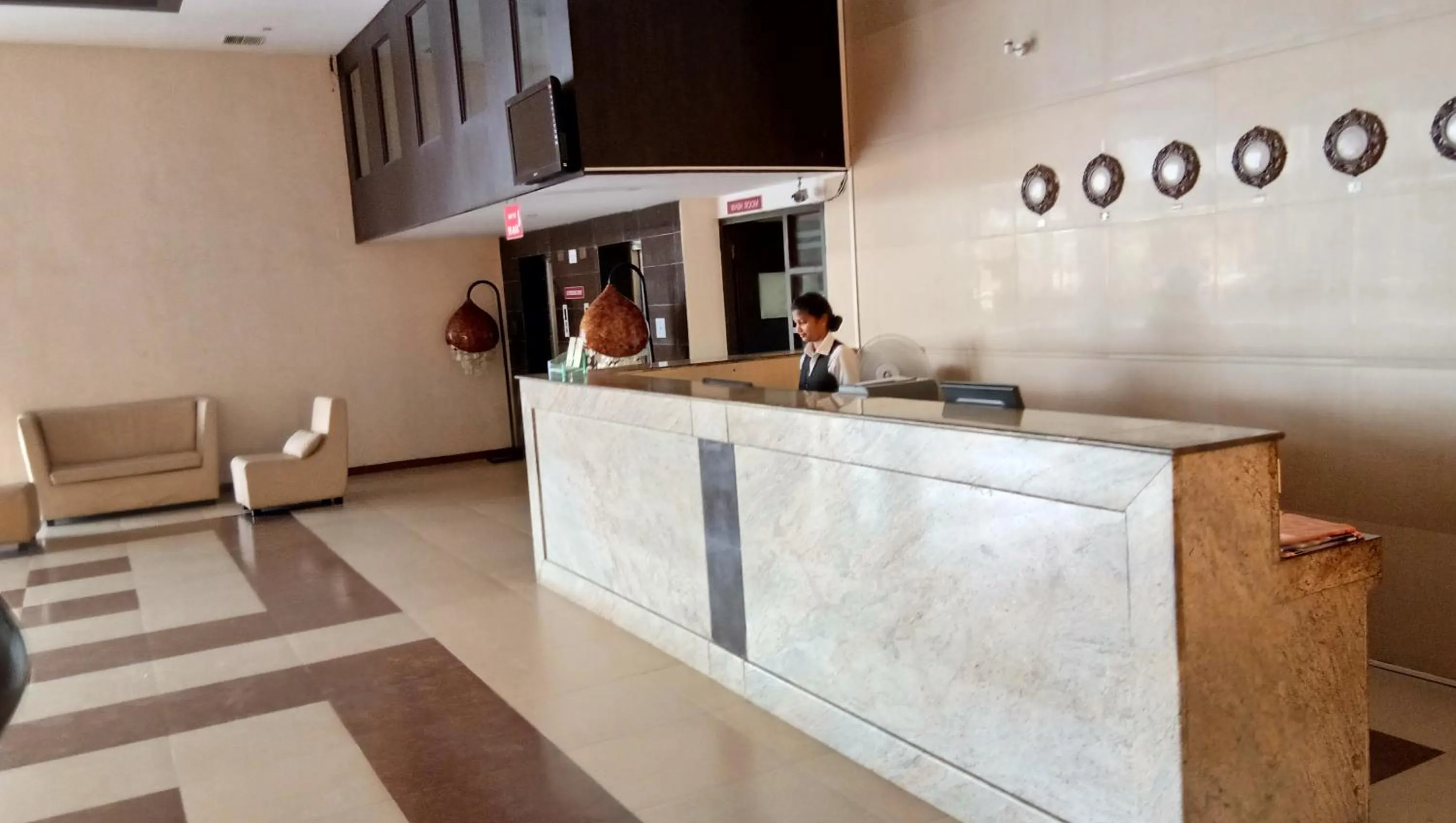 Lobby or reception in SRM Hotel