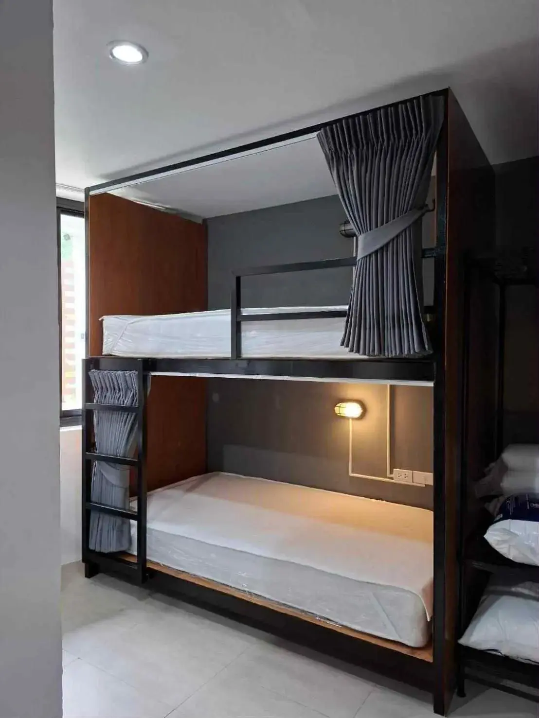 Bed in 6-Bed Mixed Dormitory Room in Phuket Muay Thai Hotel Rawai Beach Bed in 6-Bed Mixed Dormitory Room in Phuket Muay Thai Hotel Rawai Beach