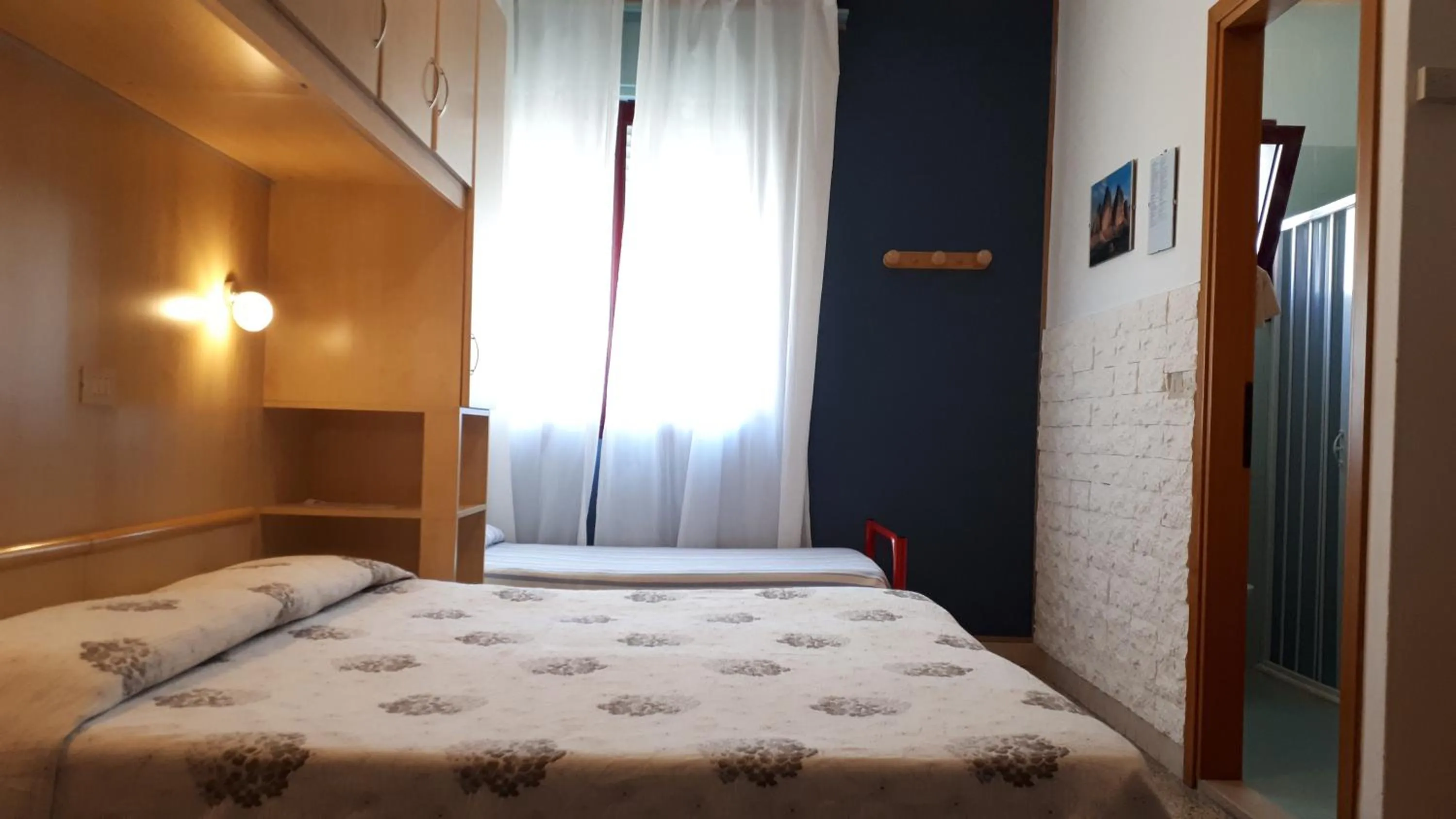 Bed in Hotel Villa Dina