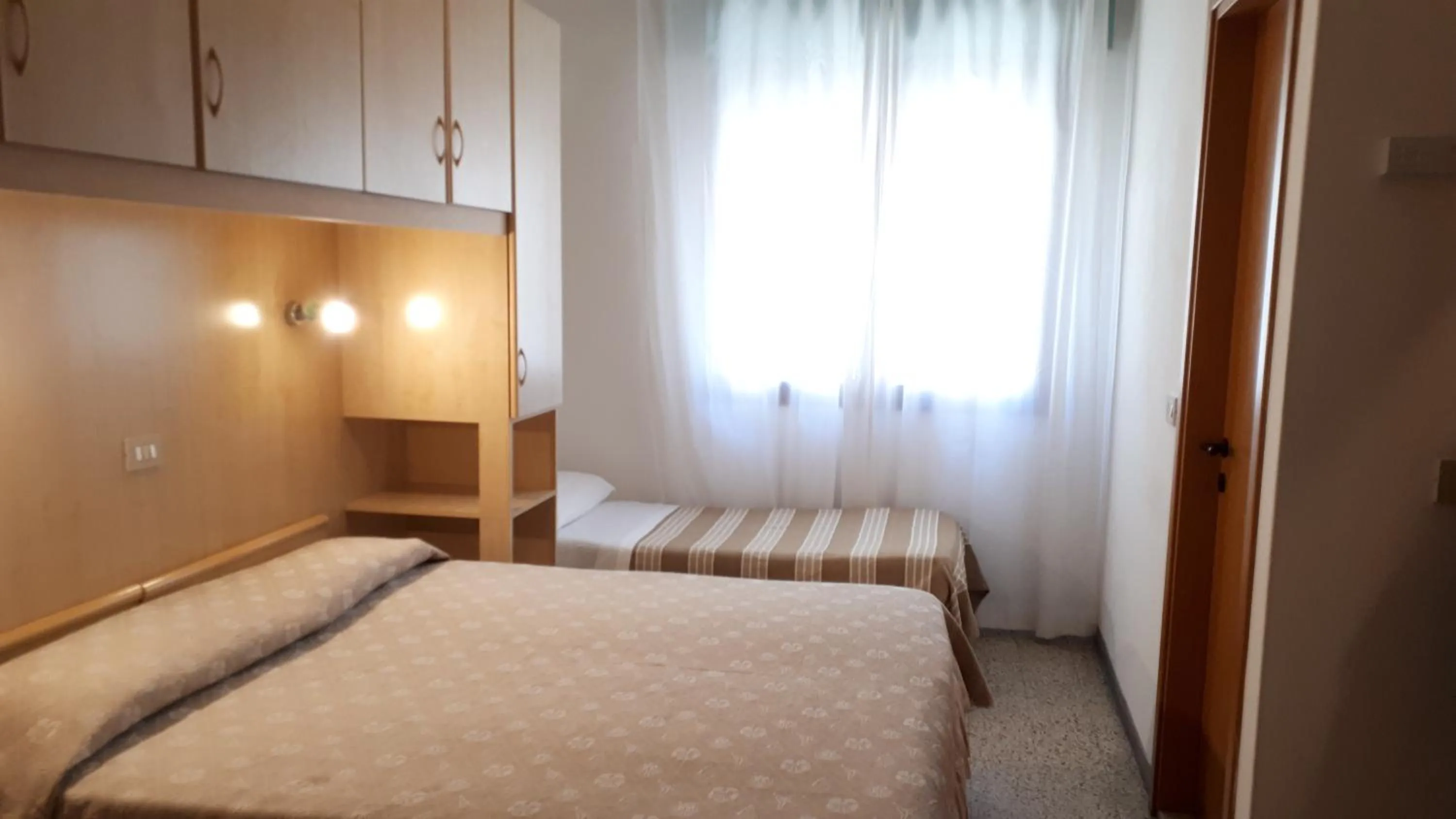 Bed in Hotel Villa Dina