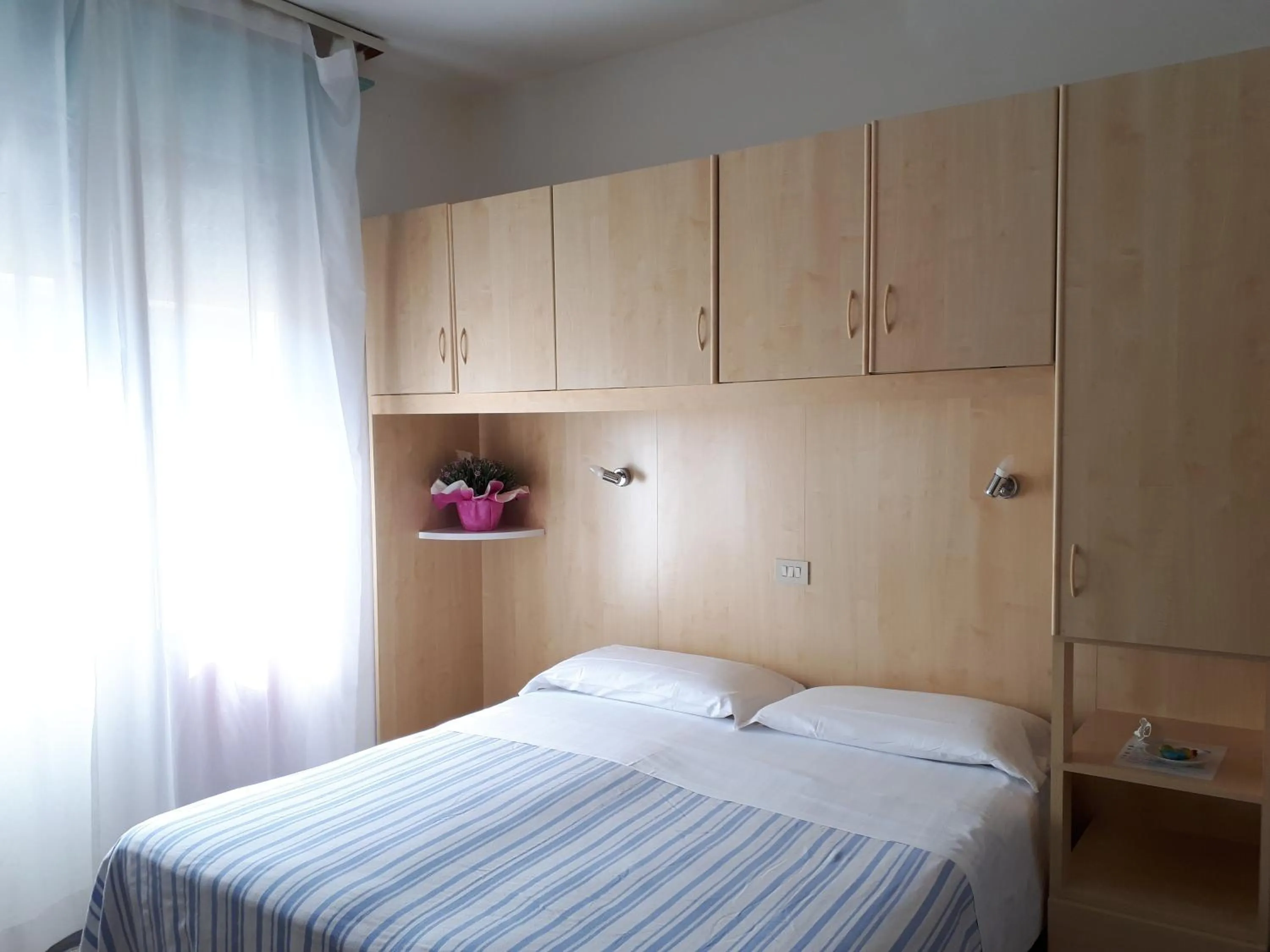 Bed in Hotel Villa Dina