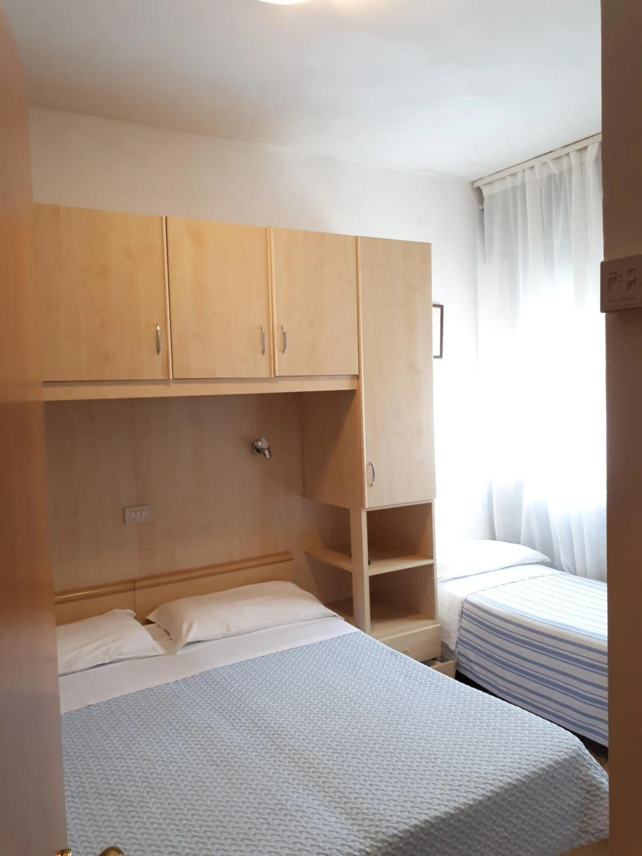 Bed in Hotel Villa Dina