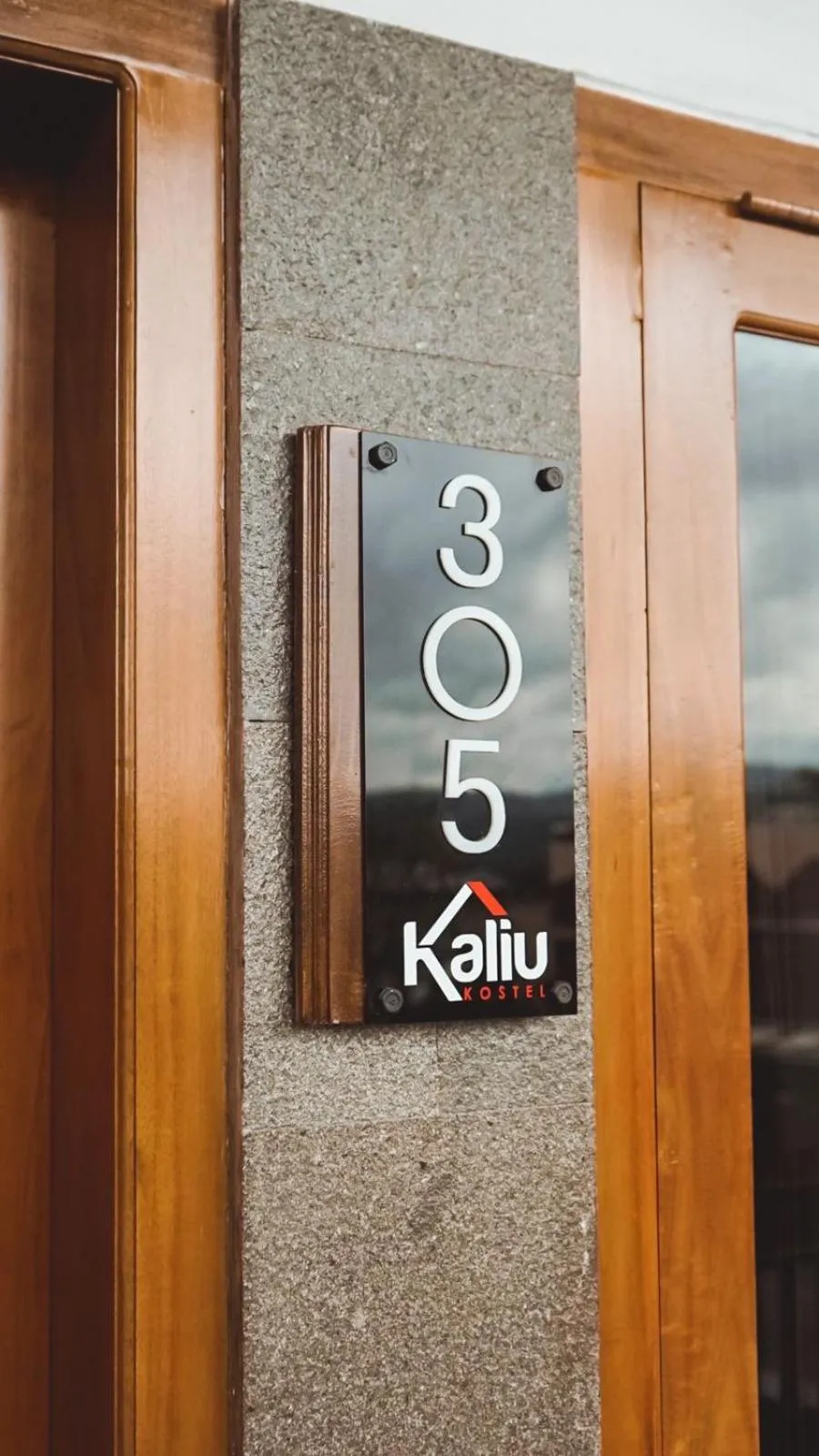 Property logo or sign in Hotel Kaliu