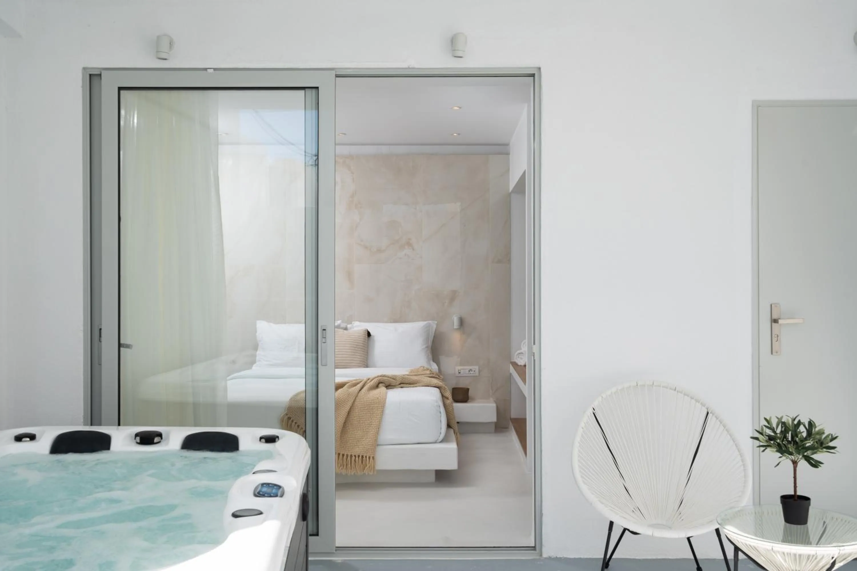 Hot Tub, Bed in Cycladic Suites & Spa