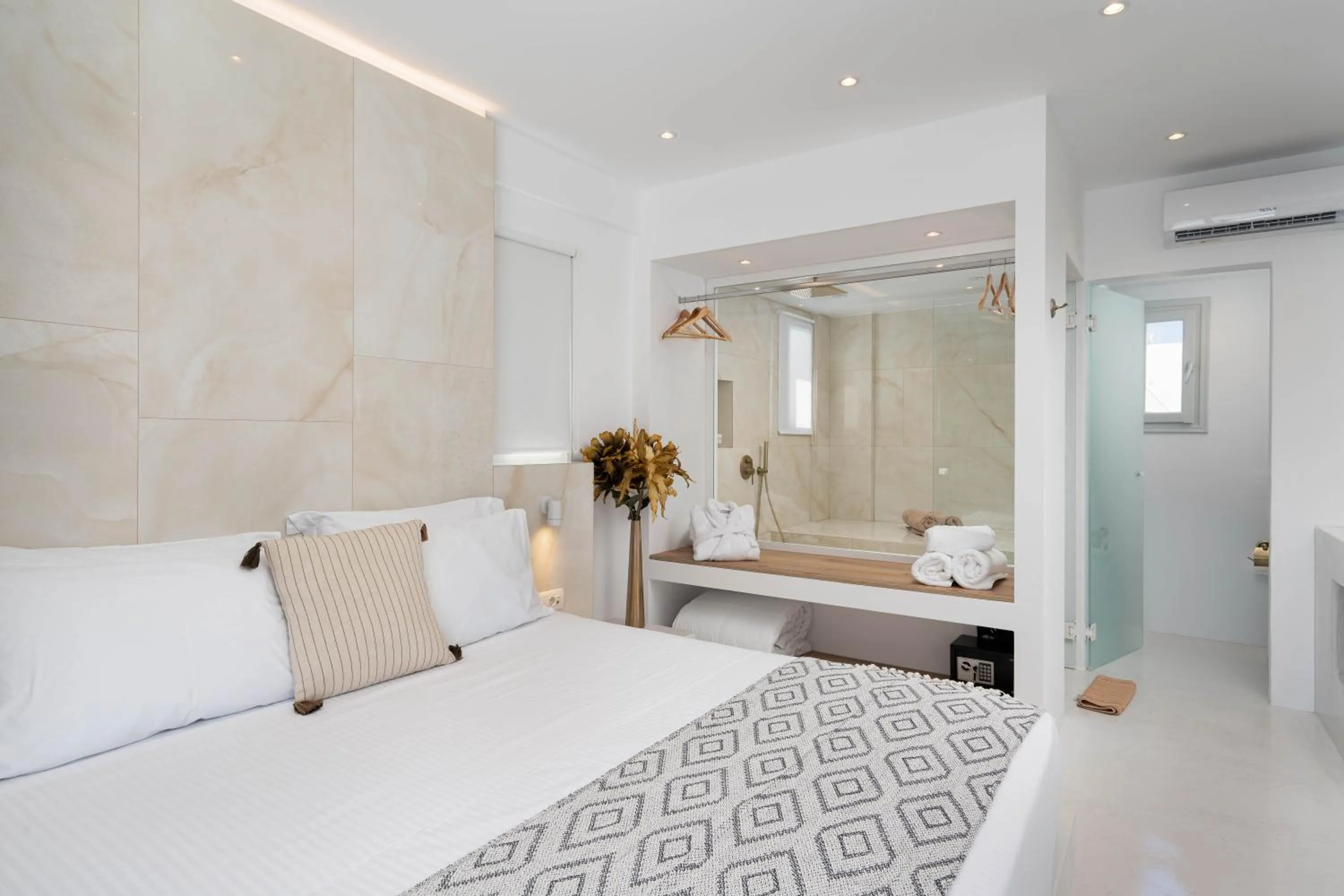 Bed in Cycladic Suites & Spa
