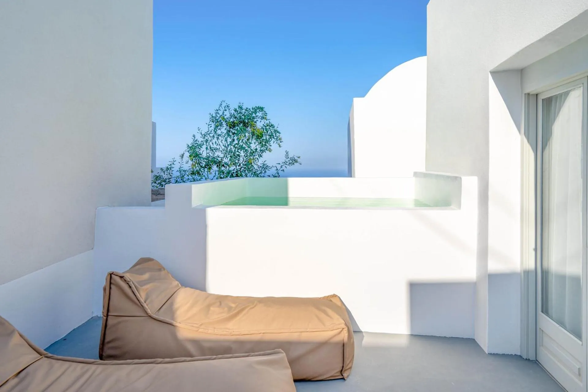Swimming pool in Cycladic Suites & Spa
