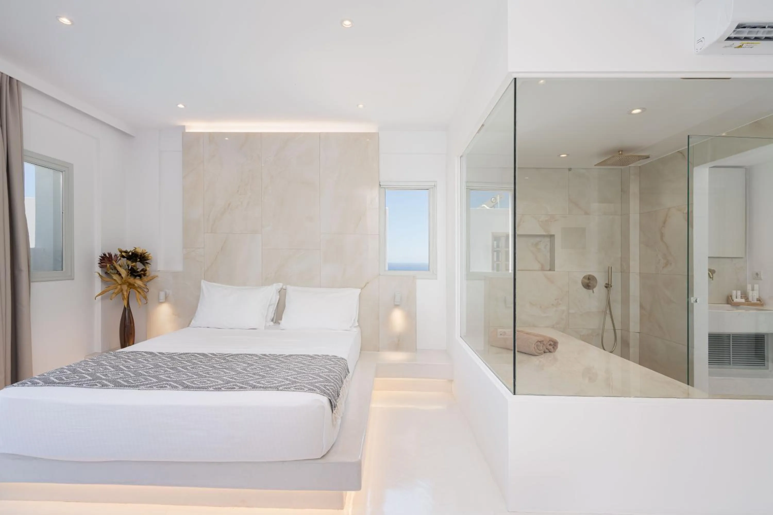 Bed in Cycladic Suites & Spa