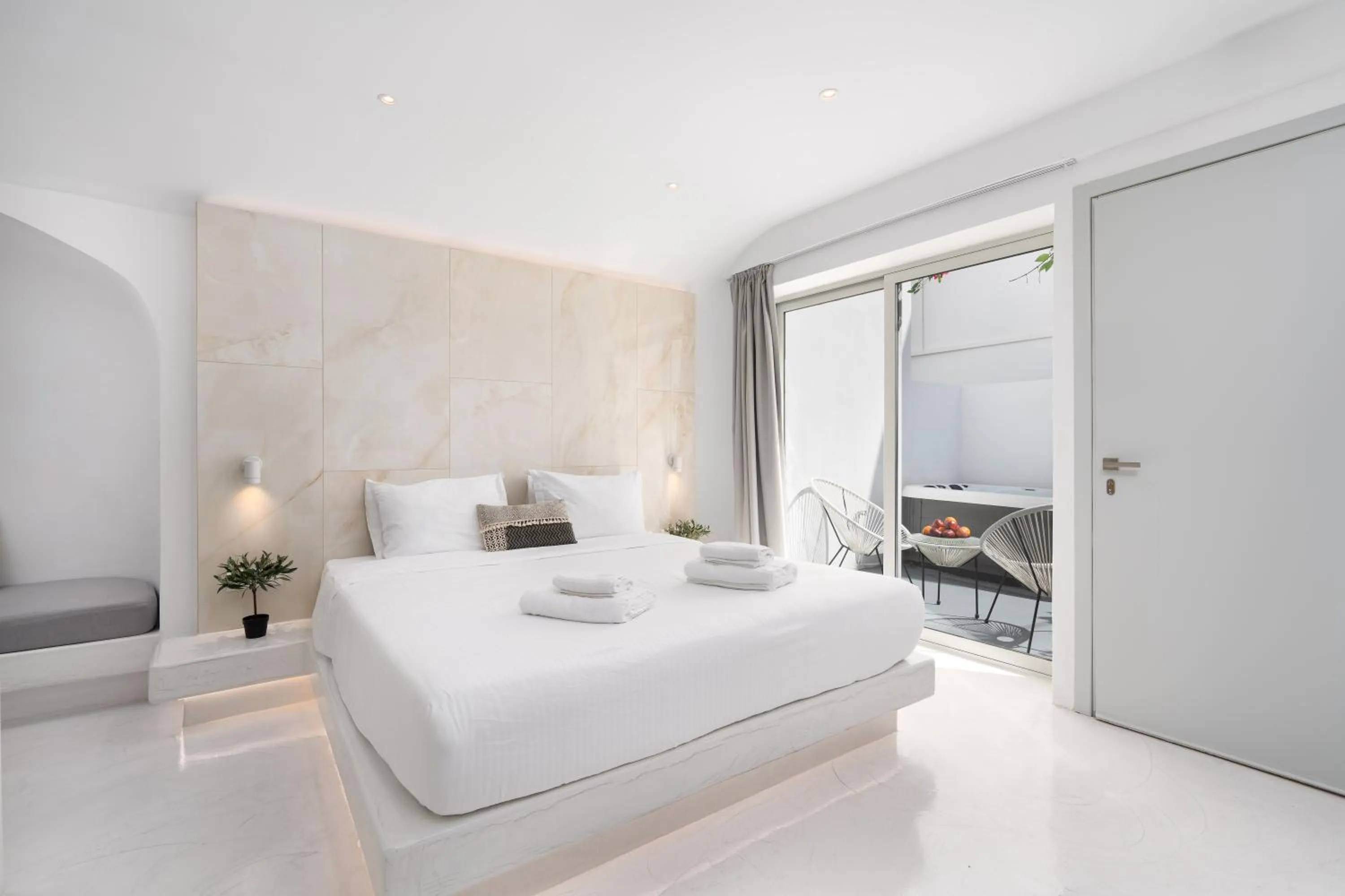 Bed in Cycladic Suites & Spa