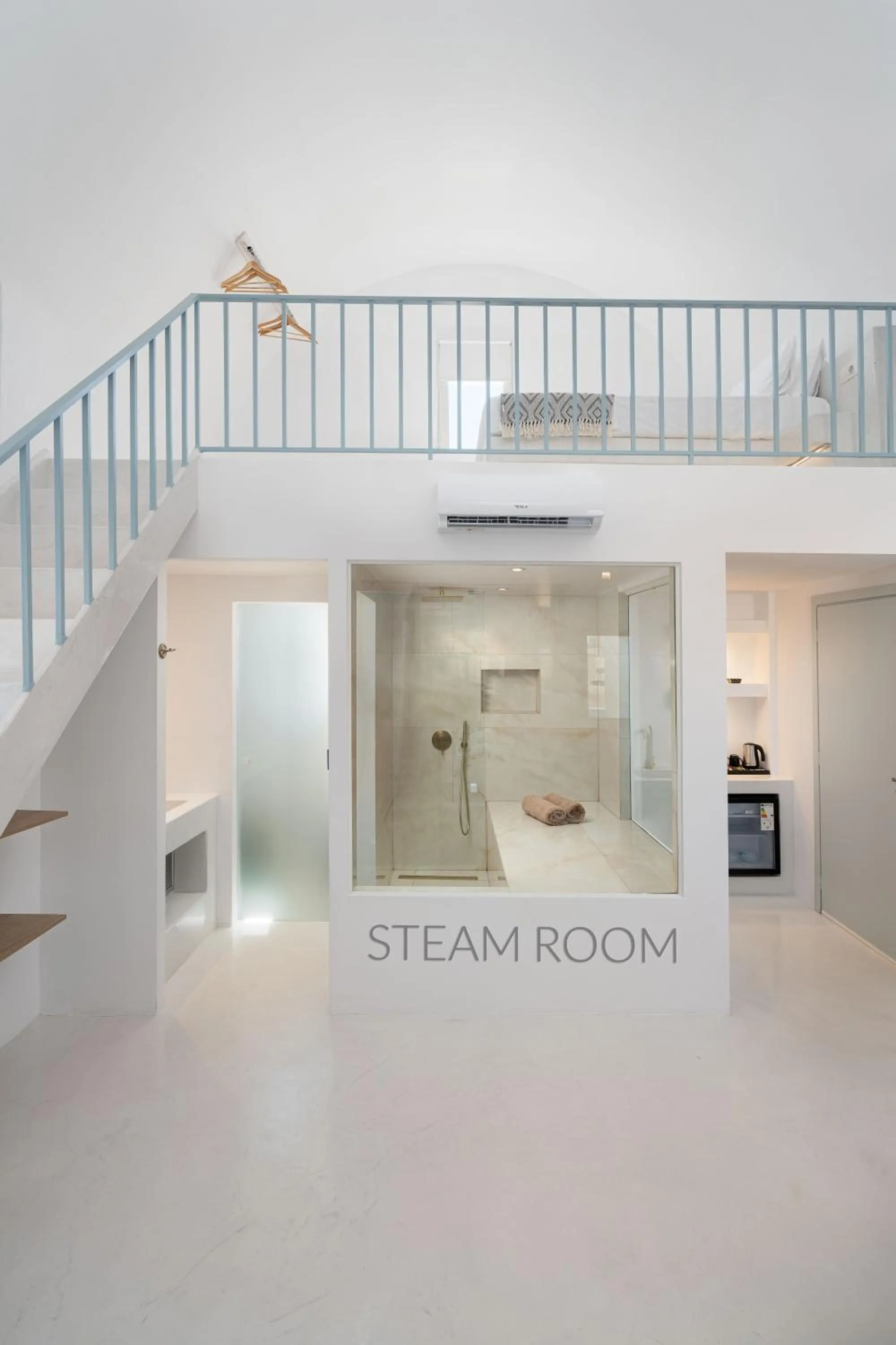 Bed in Cycladic Suites & Spa