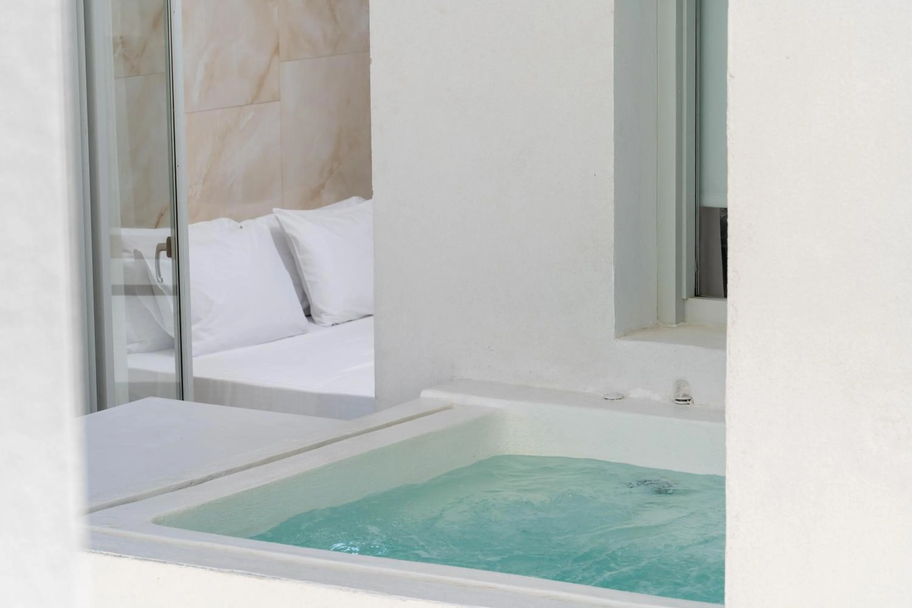 Hot Tub, Bed in Cycladic Suites & Spa