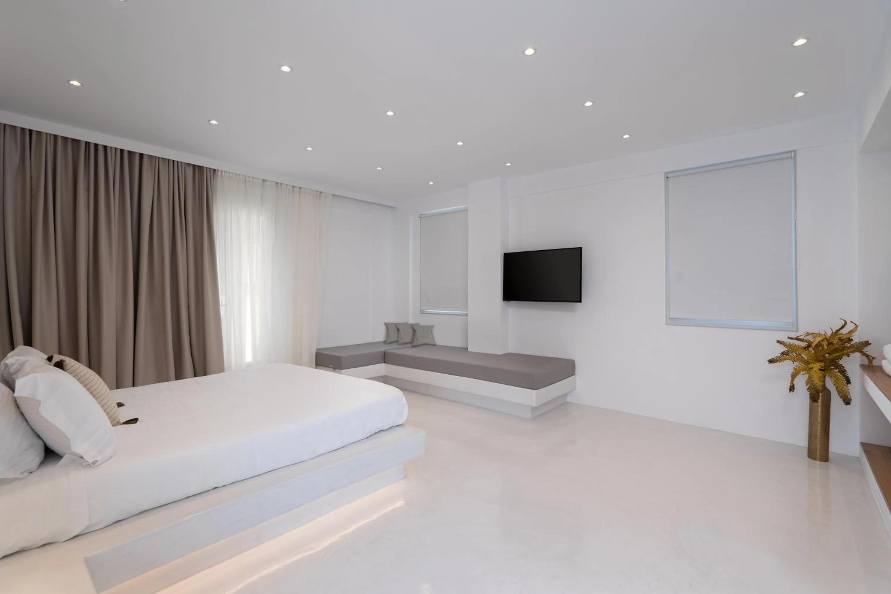 Bed in Cycladic Suites & Spa