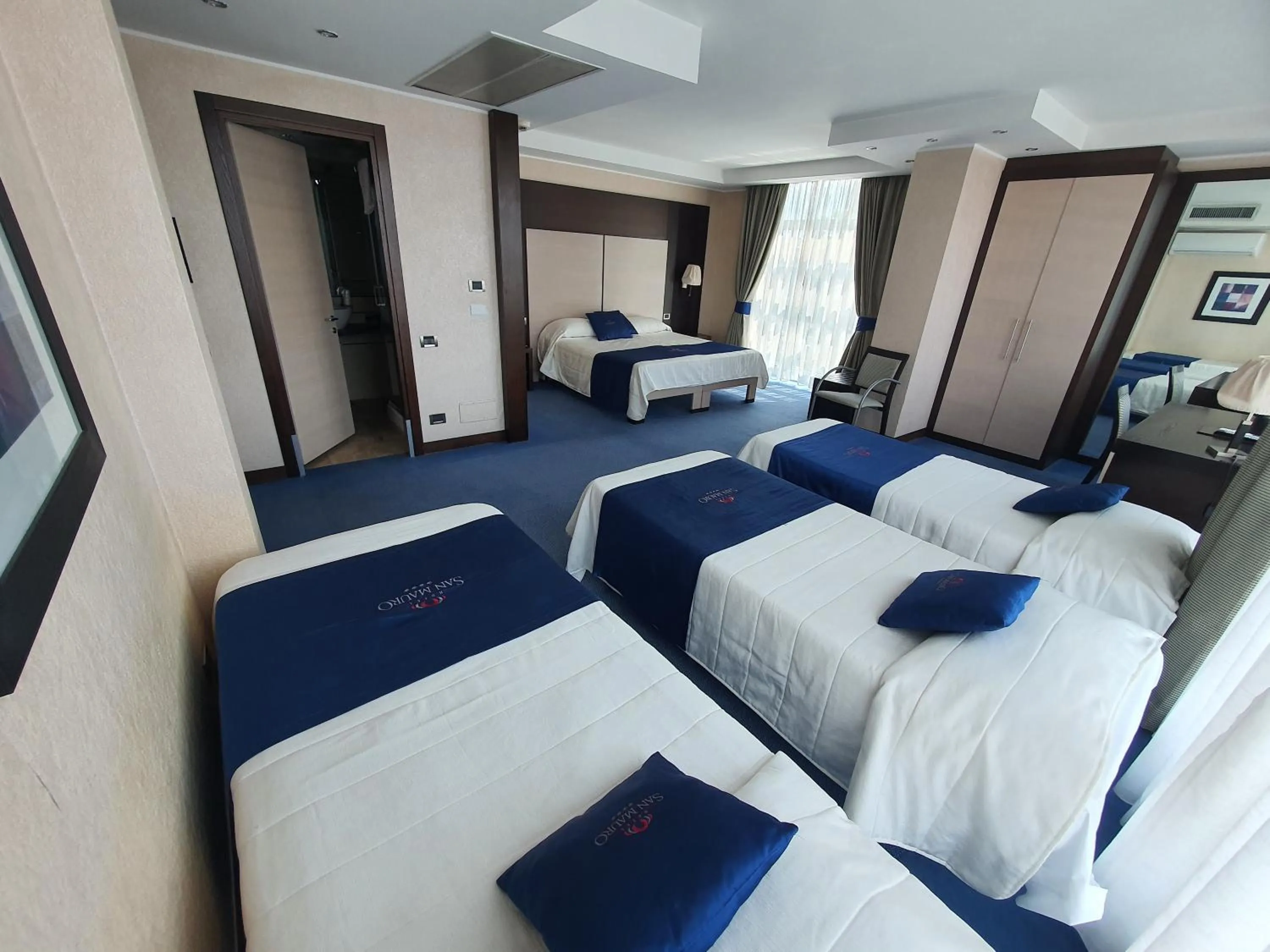 Bed in Hotel San Mauro