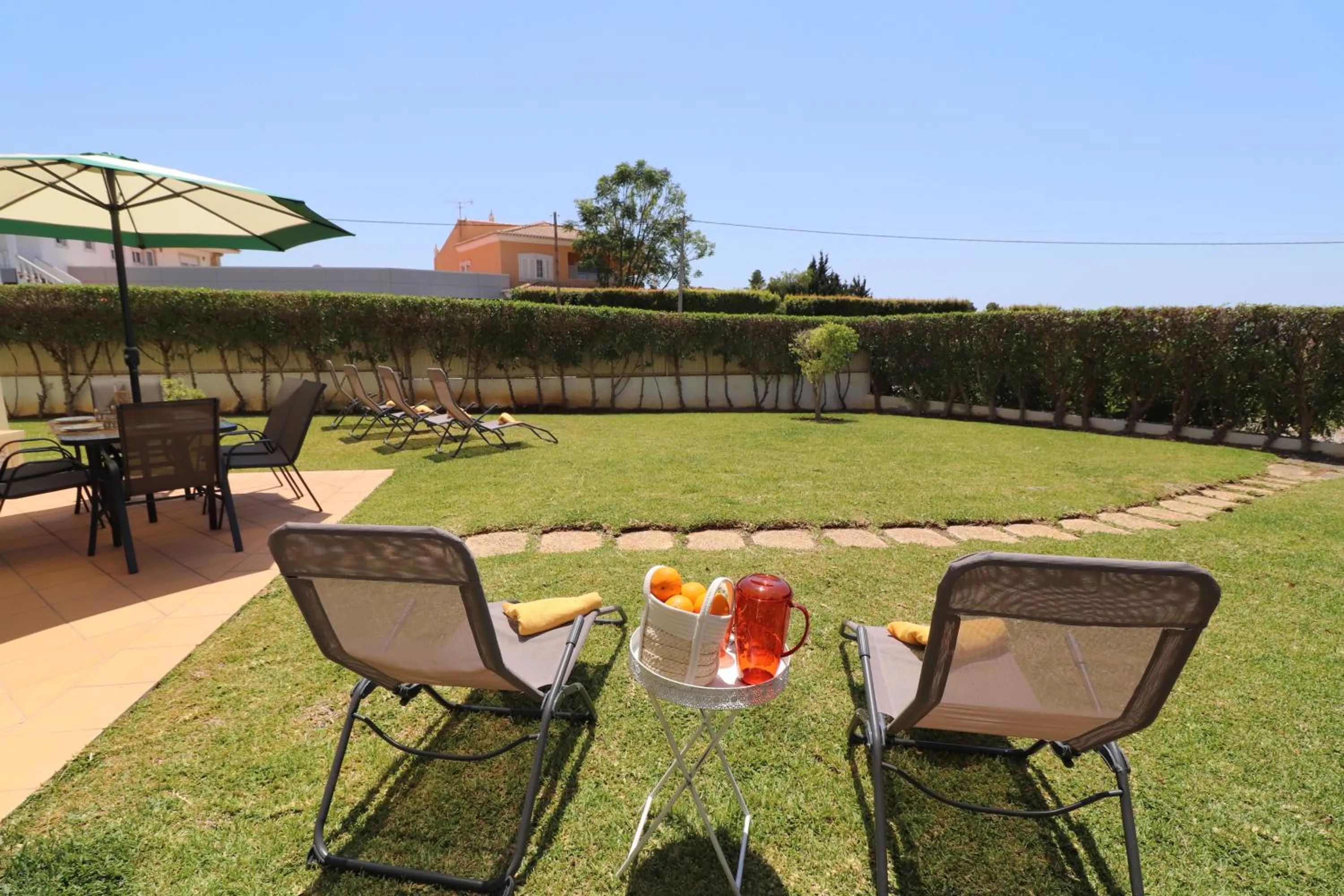 Patio in 3-Bed Townhouse with pool in Albufeira Balaia