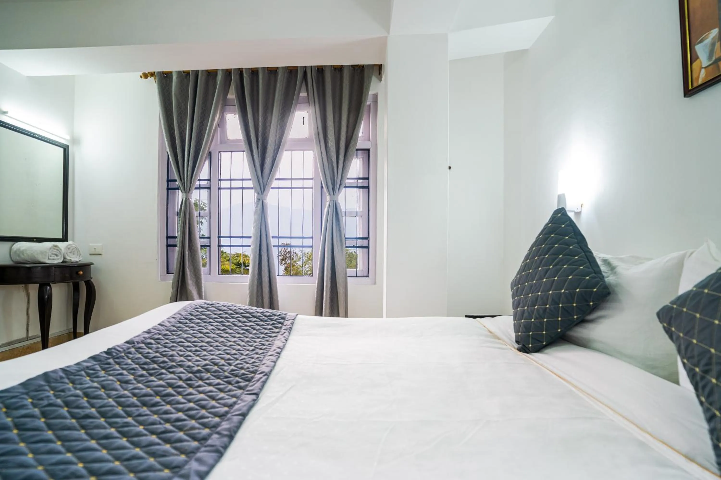 Bed in Sharolyn Boutique Hotel