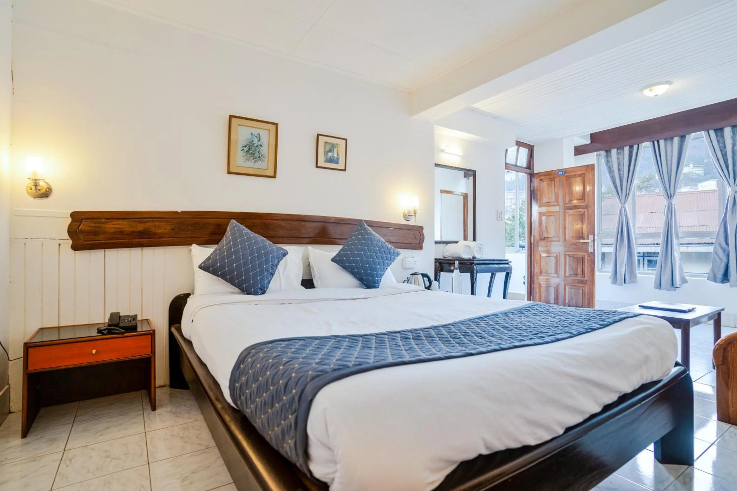 Bed in Sharolyn Boutique Hotel