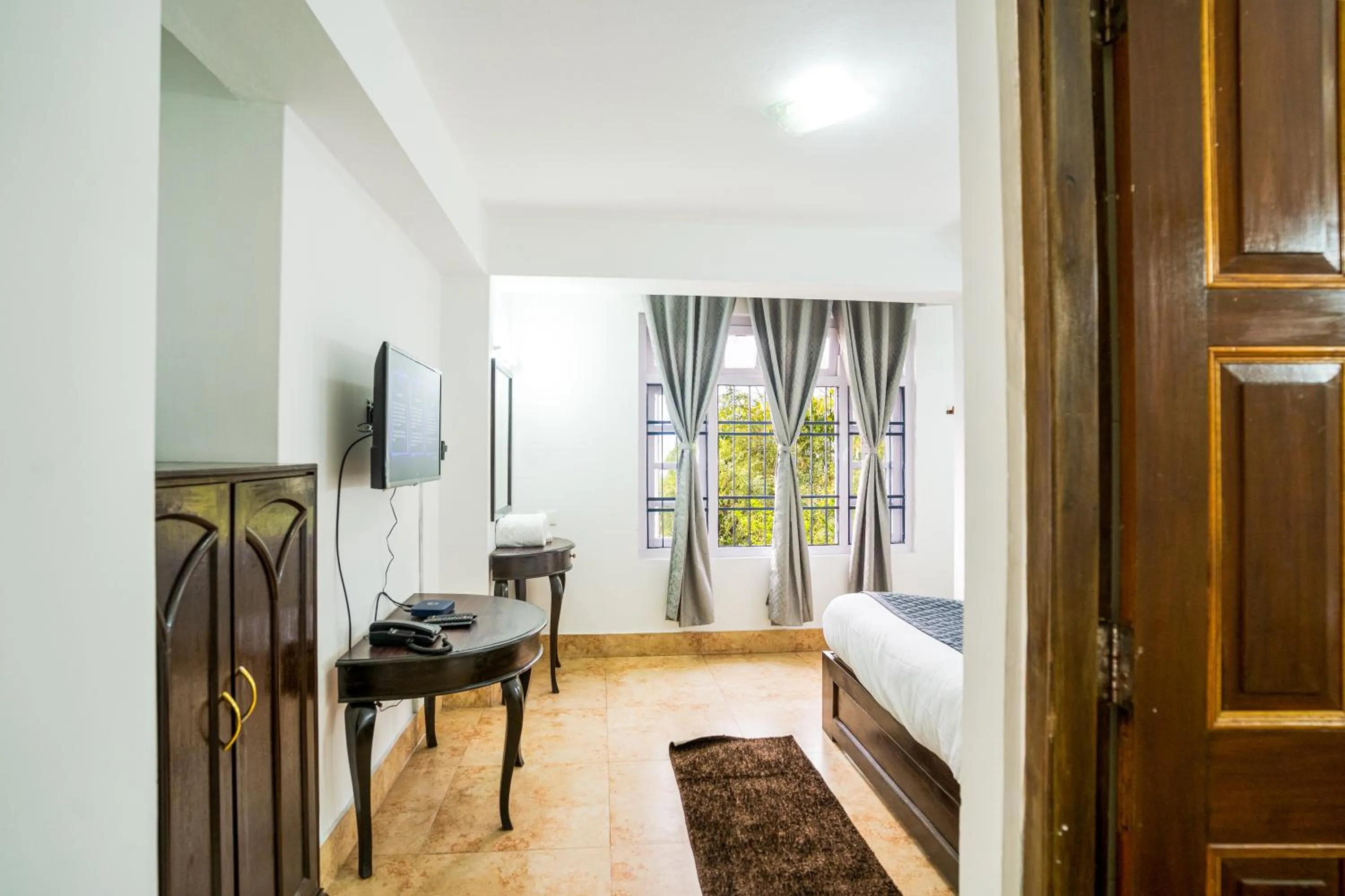 Bed in Sharolyn Boutique Hotel