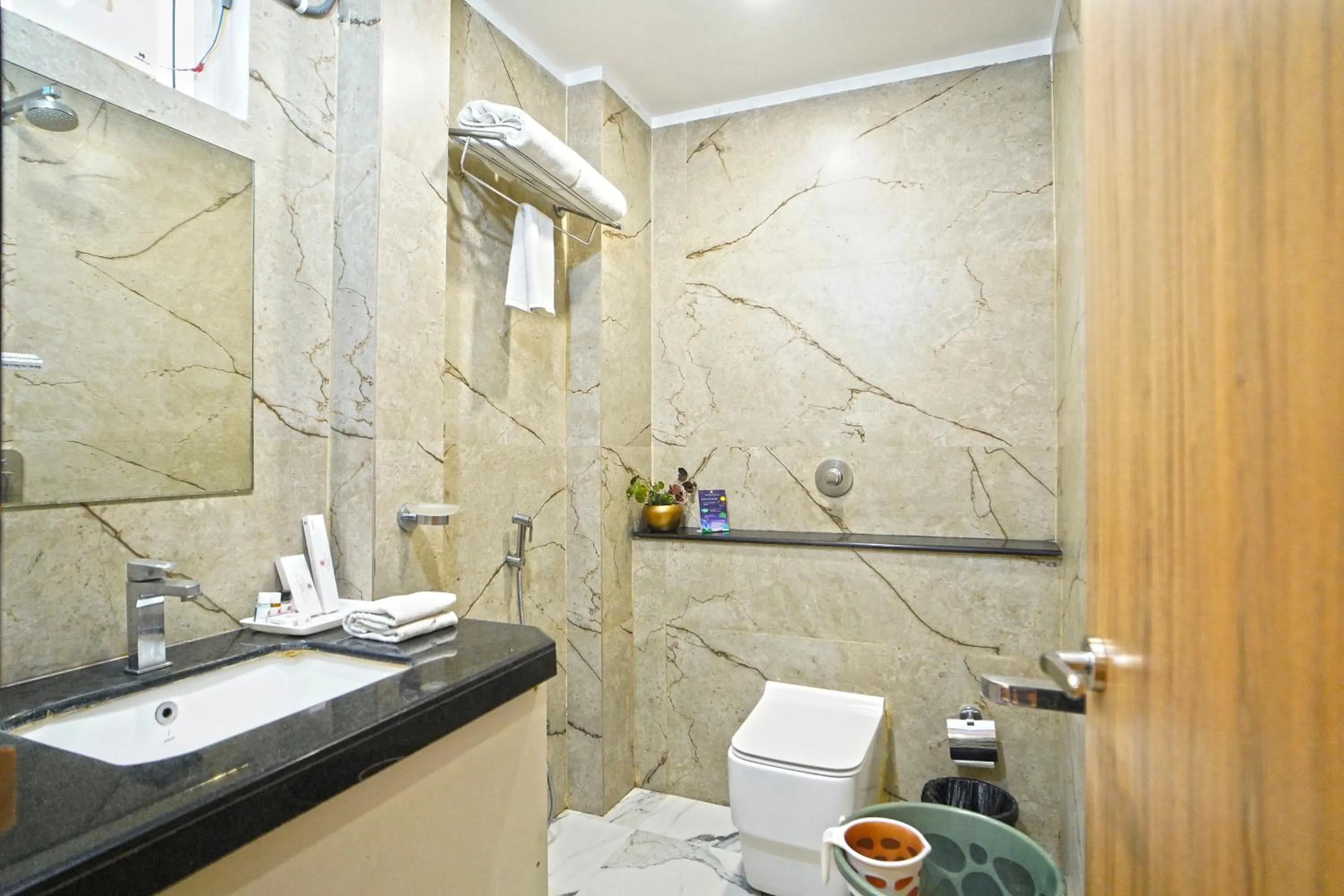 Shower in Hotel Ekta International !! 300 Mts From BABA BAIDYANATH DHAM TEMPLE !!