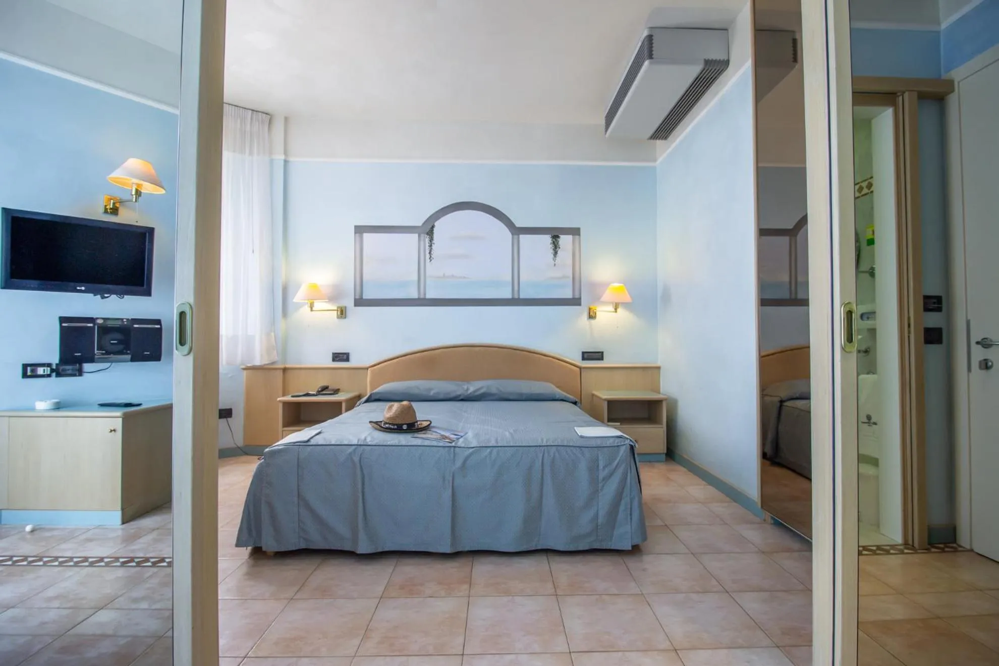 Bed in Hotel Universo