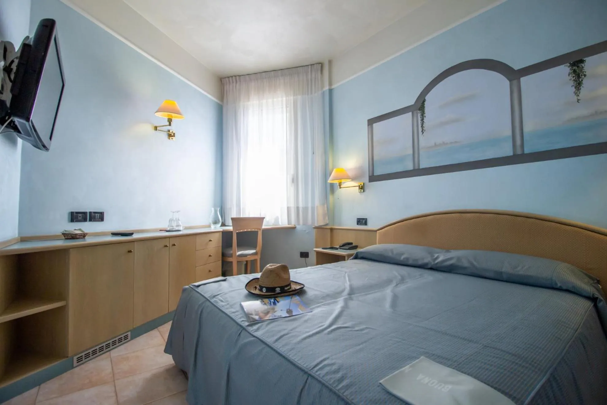 Bed in Hotel Universo