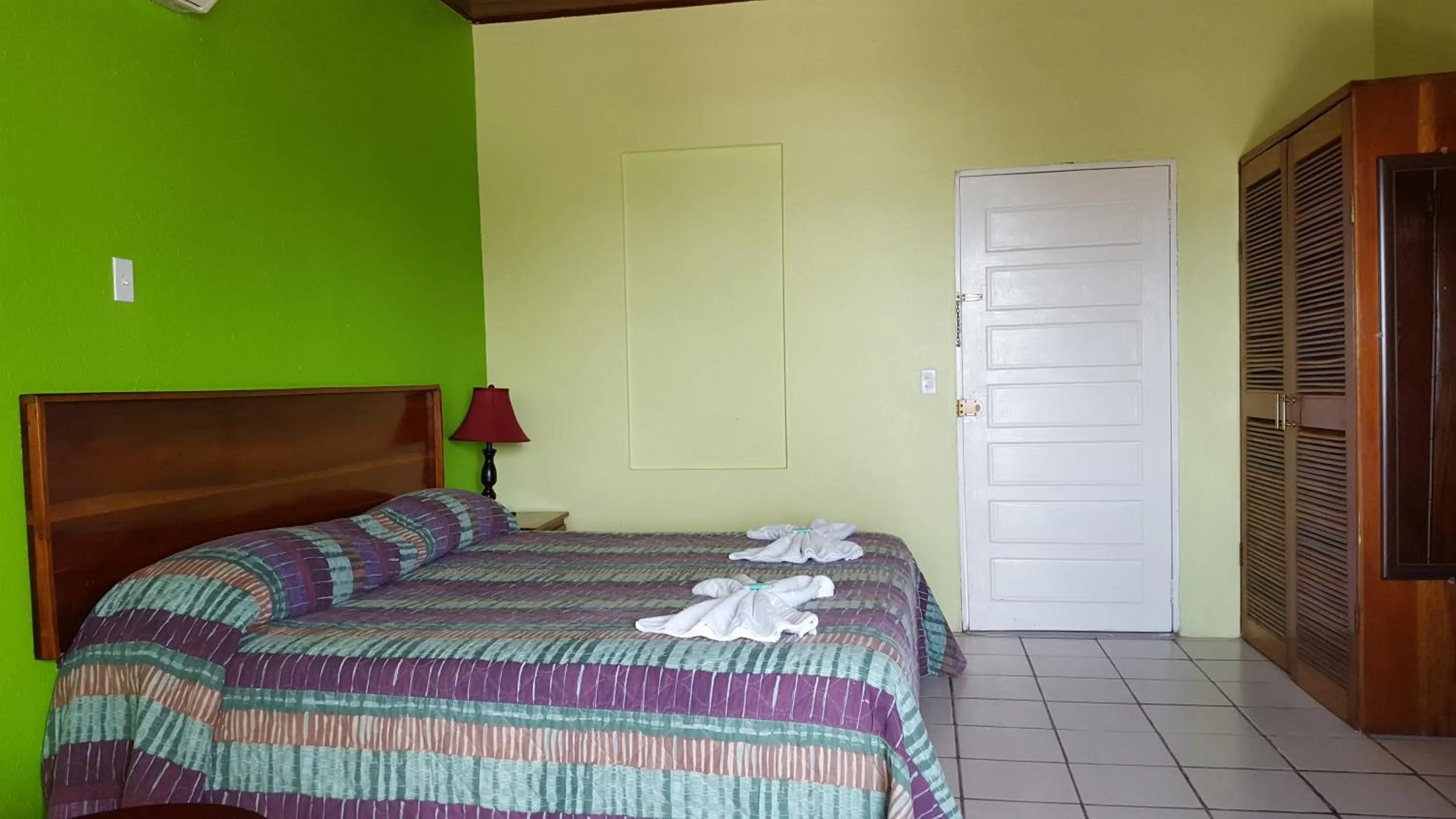 Bedroom, Bed in Anchorage Beach Resort Caye Caulker