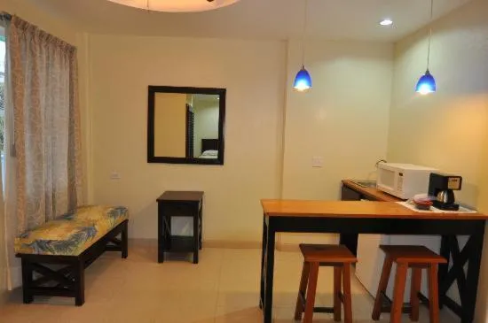 Kitchen or kitchenette, Bed in Rainbow Hotel