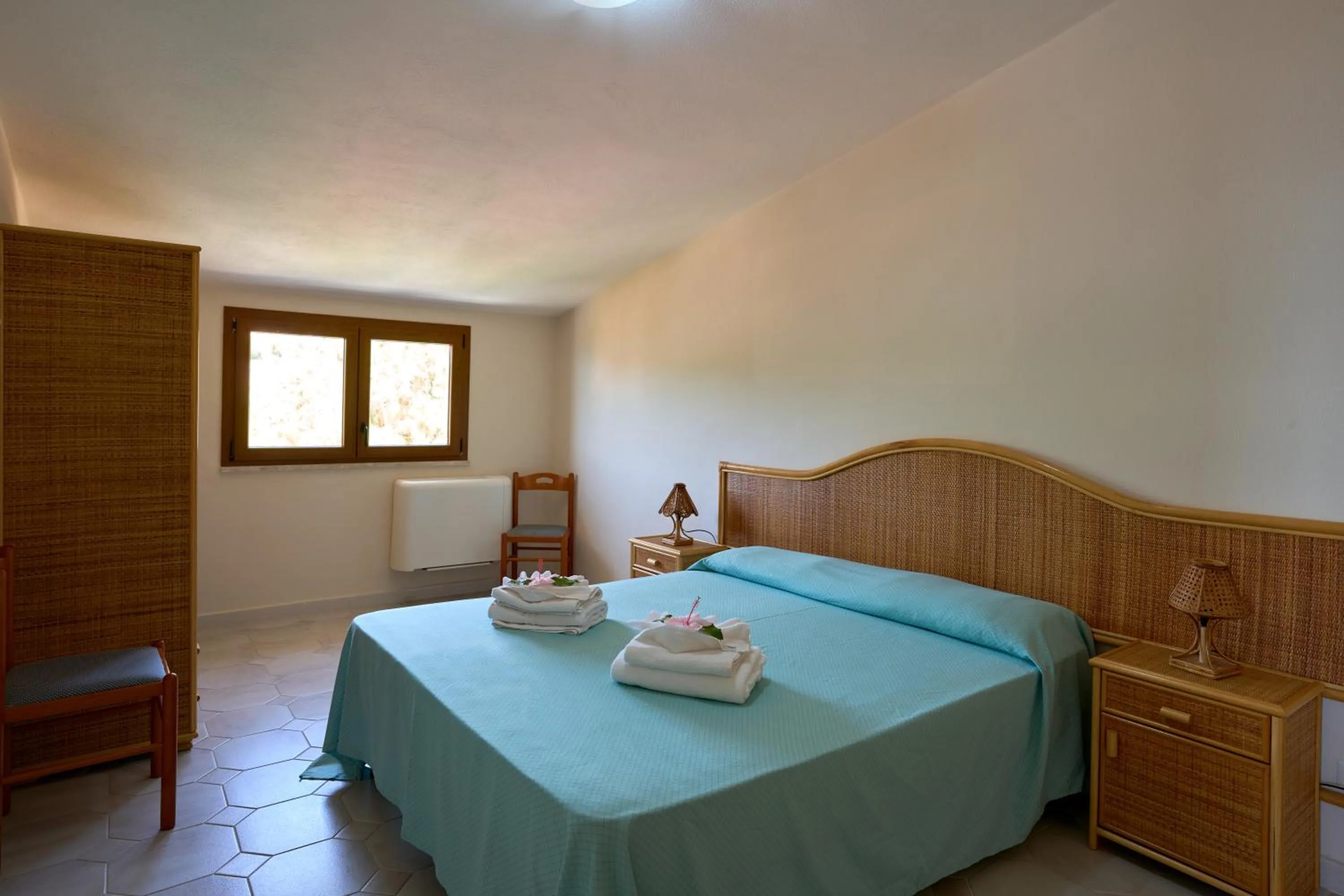 Photo of the whole room, Bed in Villaggio Santa Maria