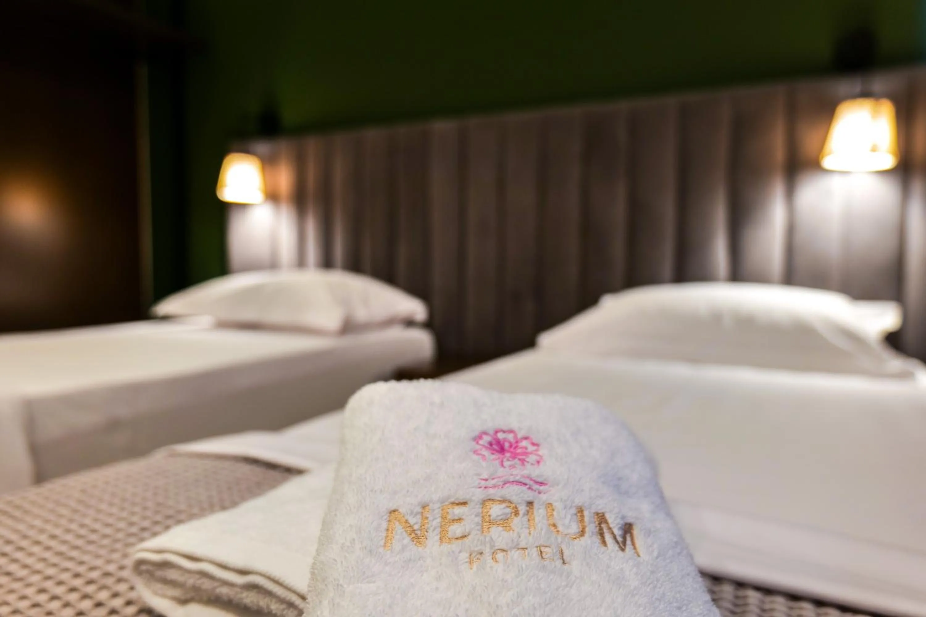 towels, Bed in Hotel Nerium