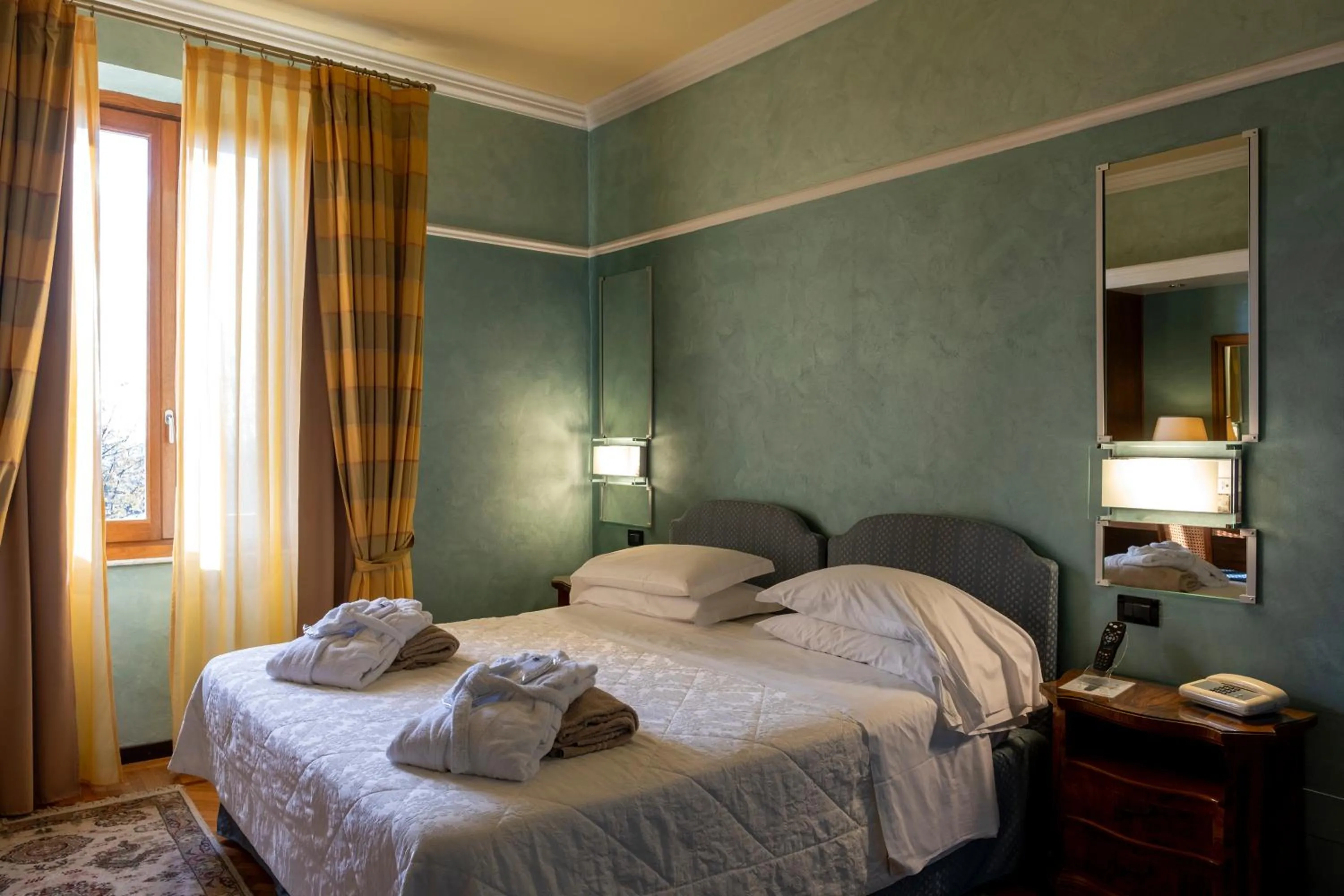 Bedroom, Bed in Grand Hotel Bellavista Palace & Golf
