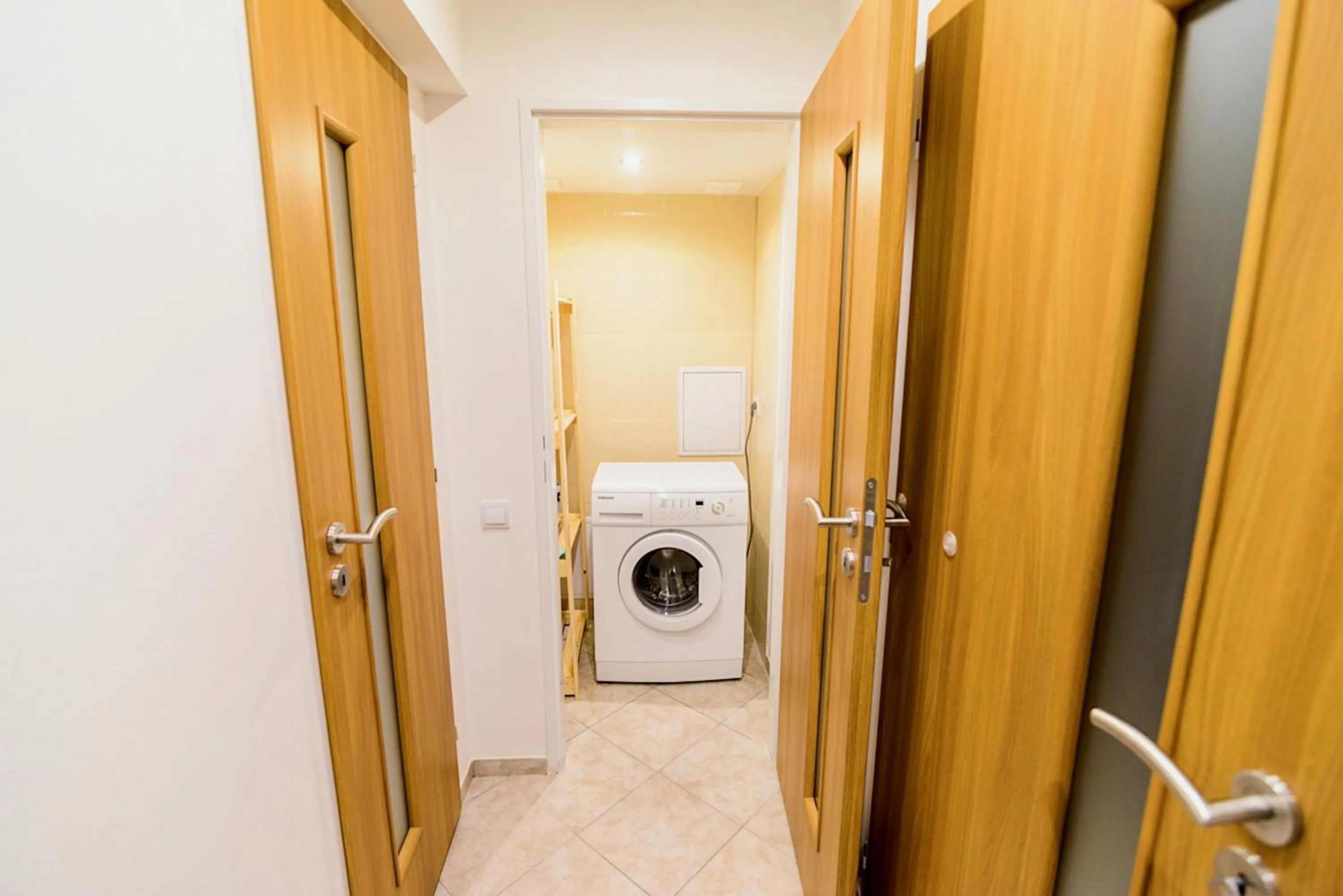 washing machine in Ground Floor Apartment