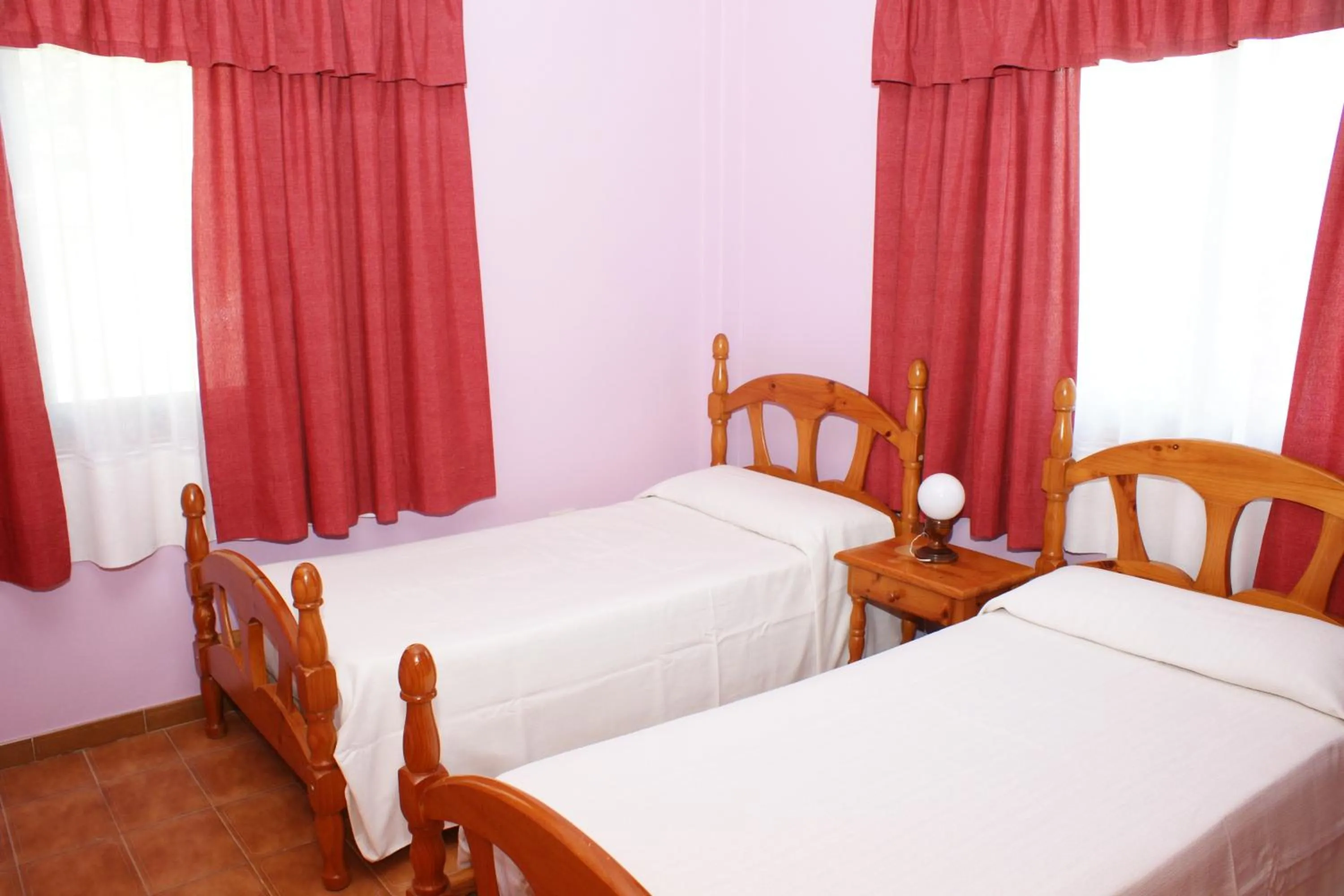 Bedroom, Bed in Apartamentos Nelly