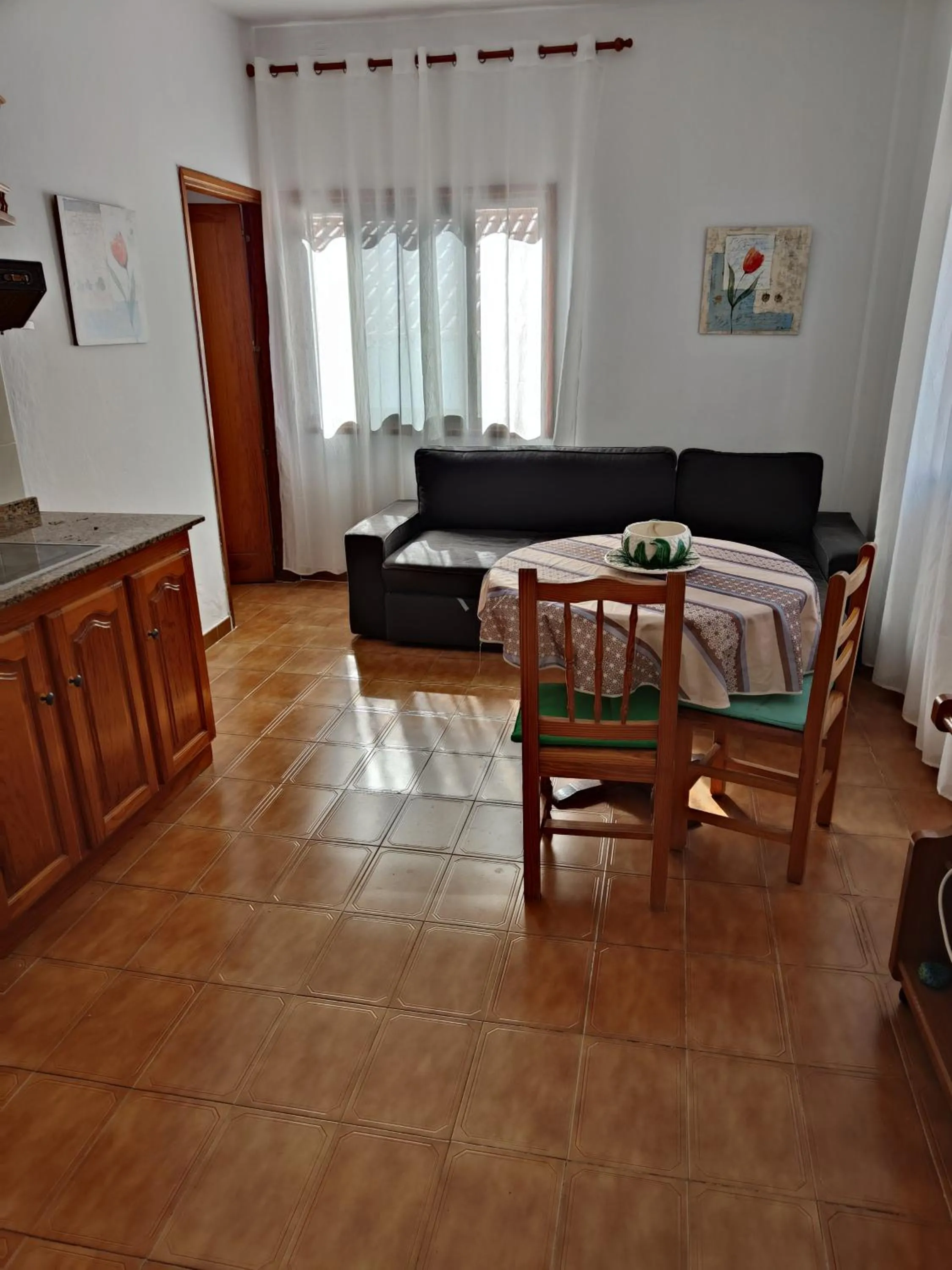 Kitchen or kitchenette in Apartamentos Nelly