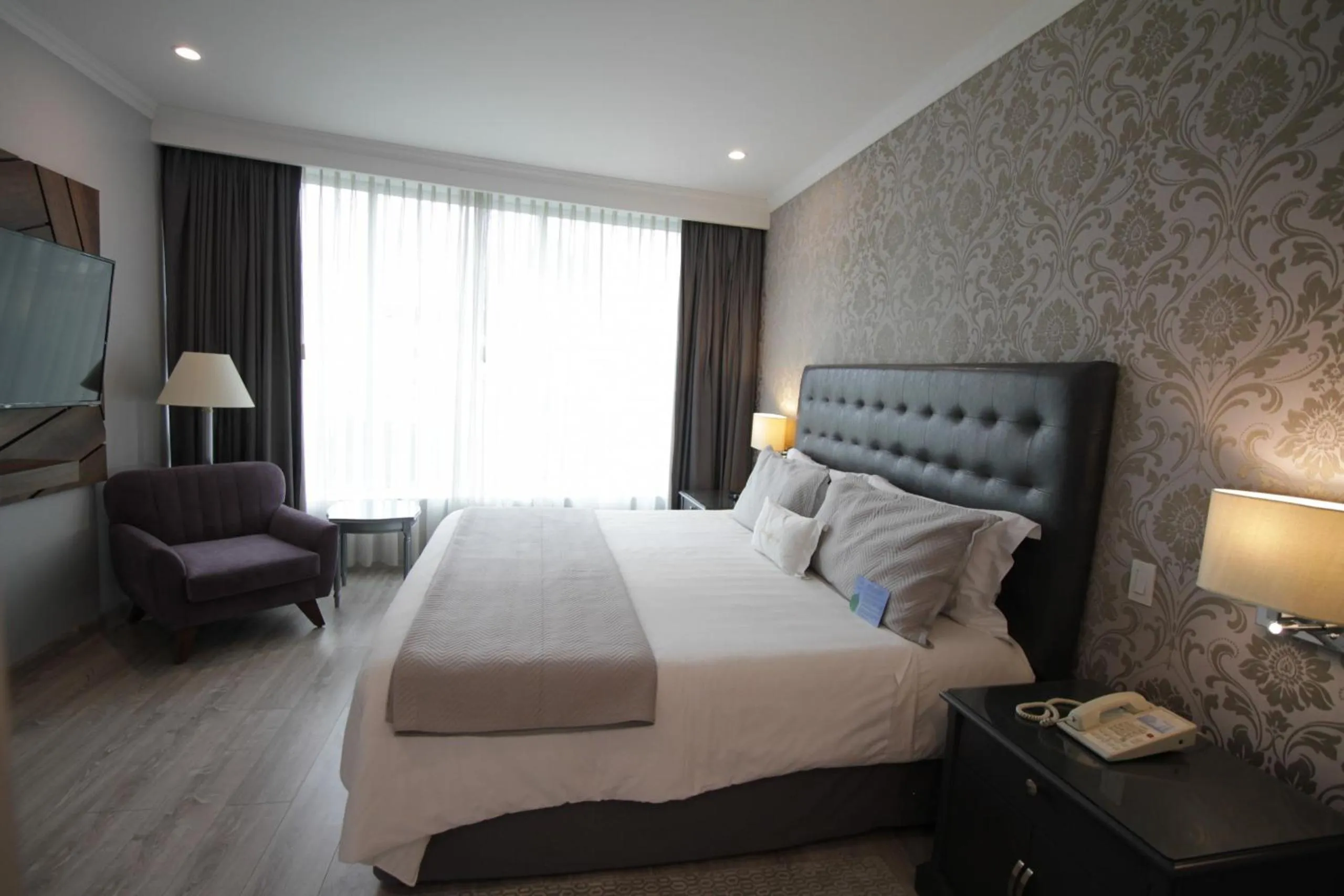Bed in Aparta Hotel Torres de Suites