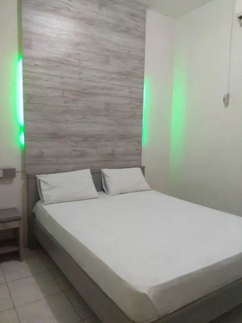 Bed in HOTEL MAYA Bed in HOTEL MAYA