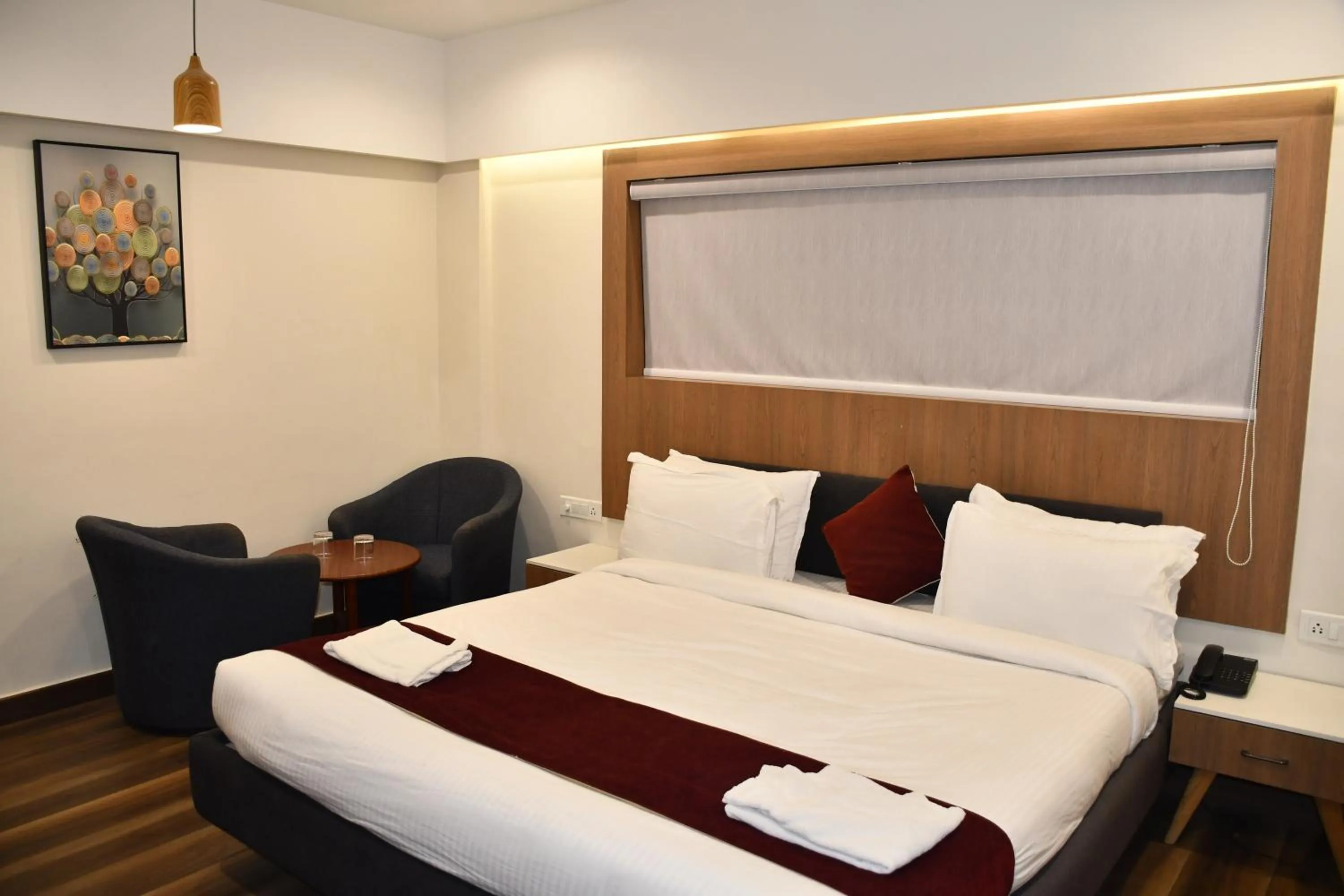 Bedroom in Hotel welcome somnath