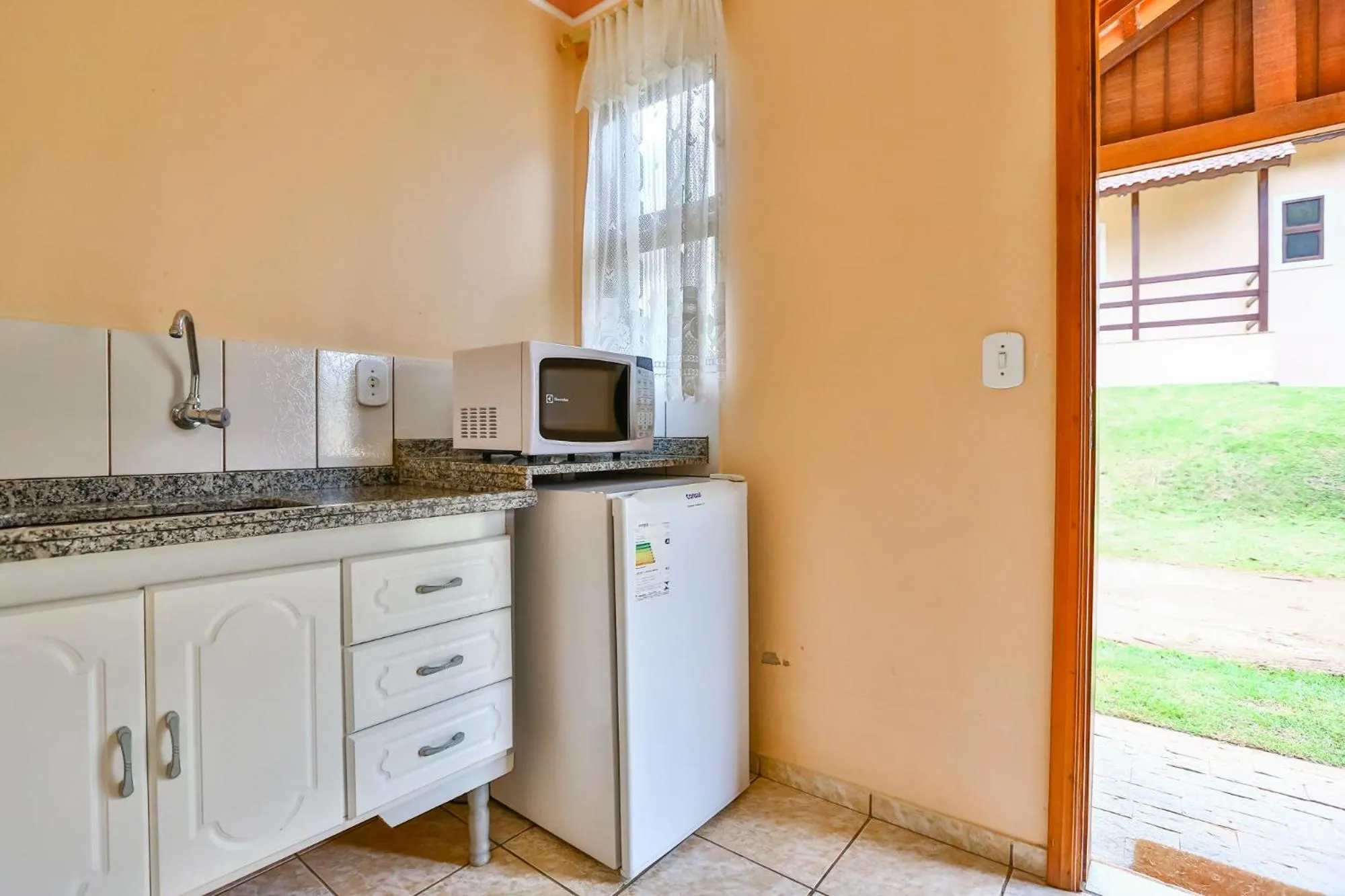 Kitchen or kitchenette in Pousada Recanto do Amanhecer