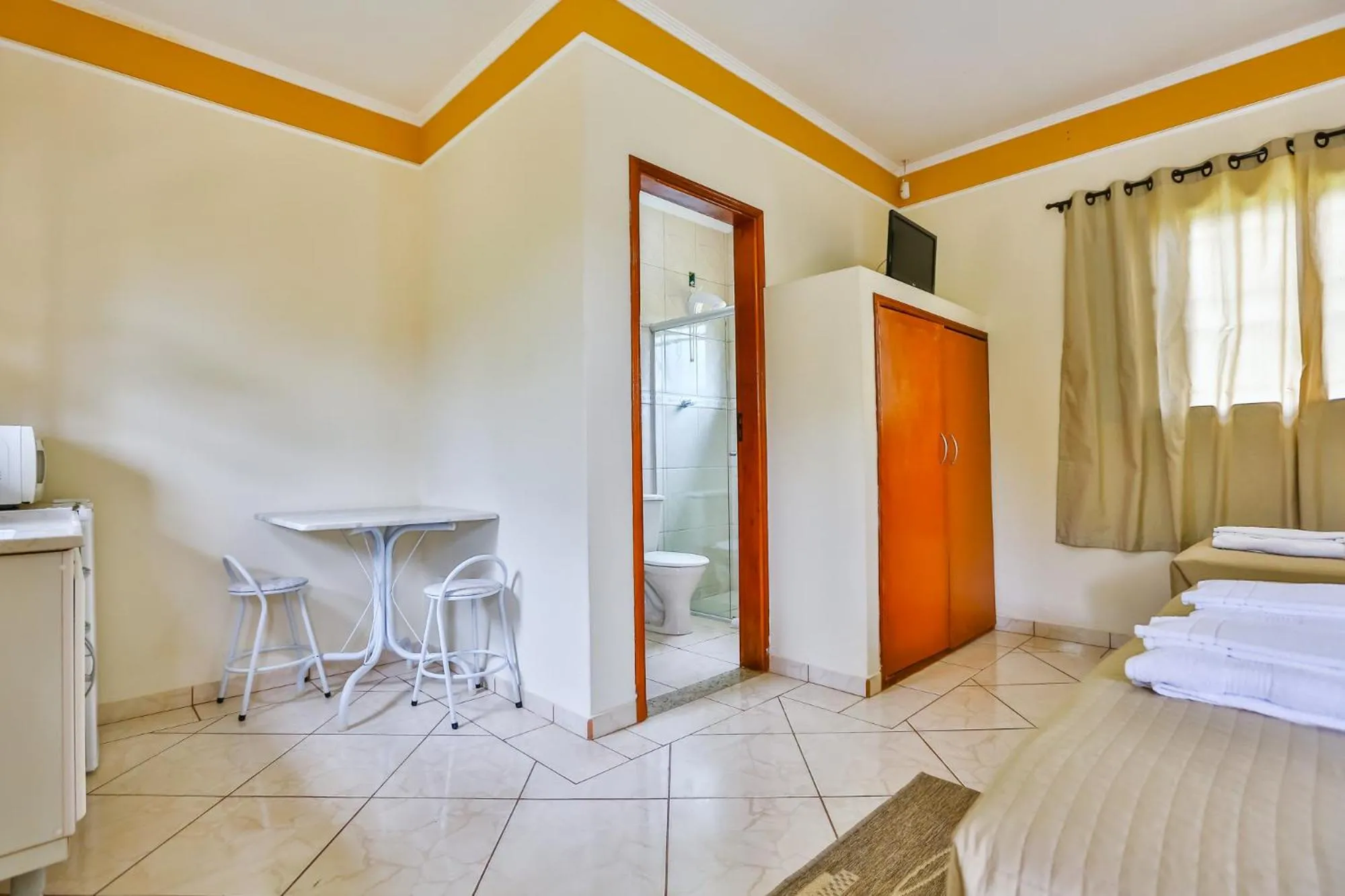 Dining area, Bed in Pousada Recanto do Amanhecer