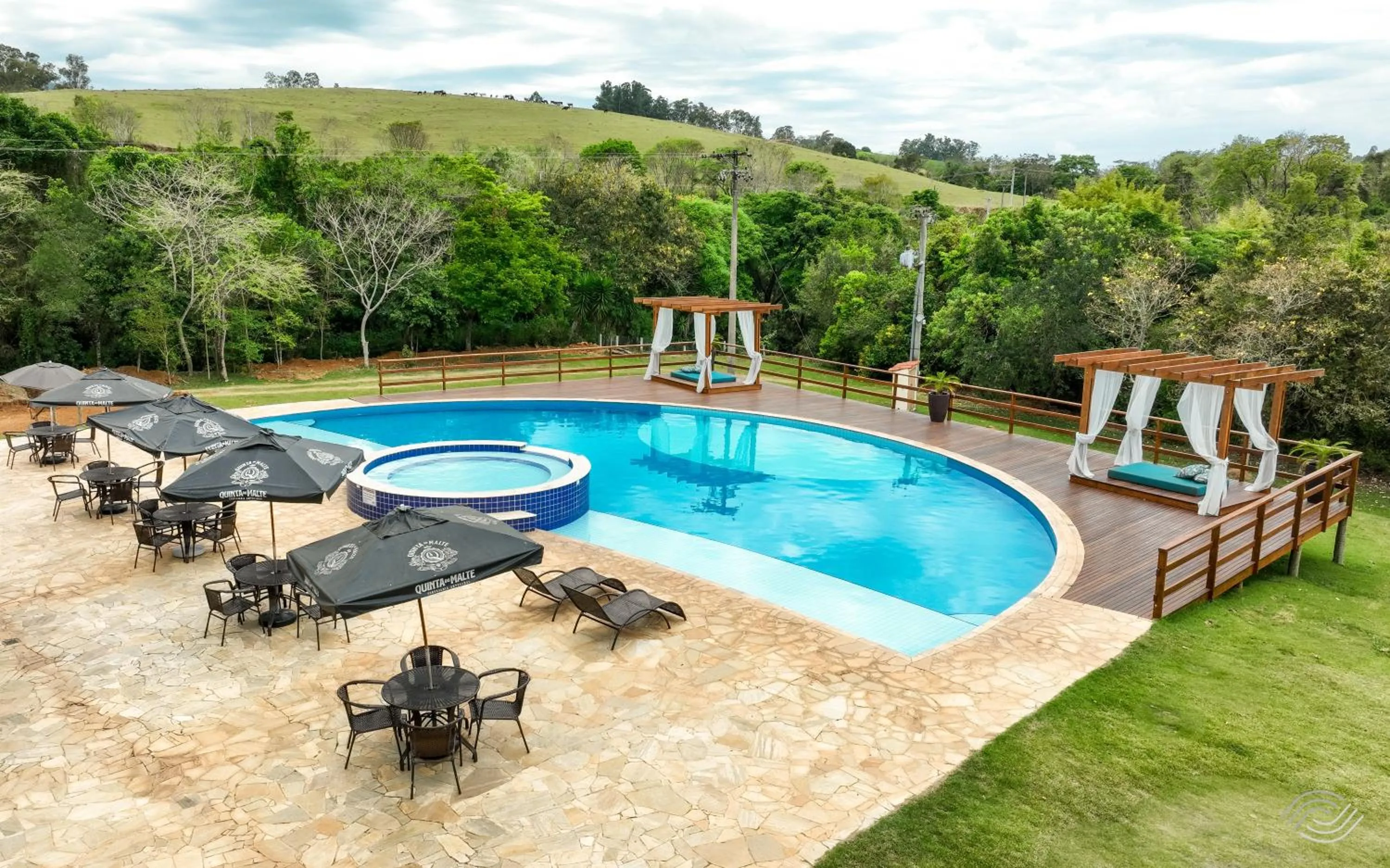 Swimming pool in Pousada Recanto do Amanhecer