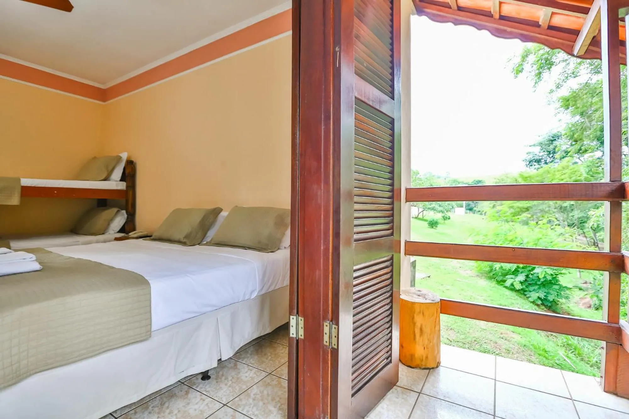 Garden view, Bed in Pousada Recanto do Amanhecer