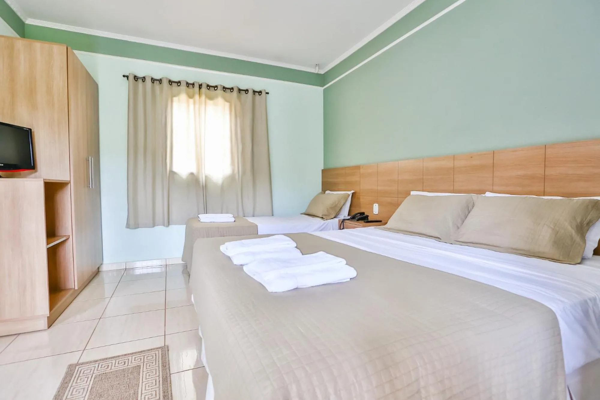 Bed in Pousada Recanto do Amanhecer