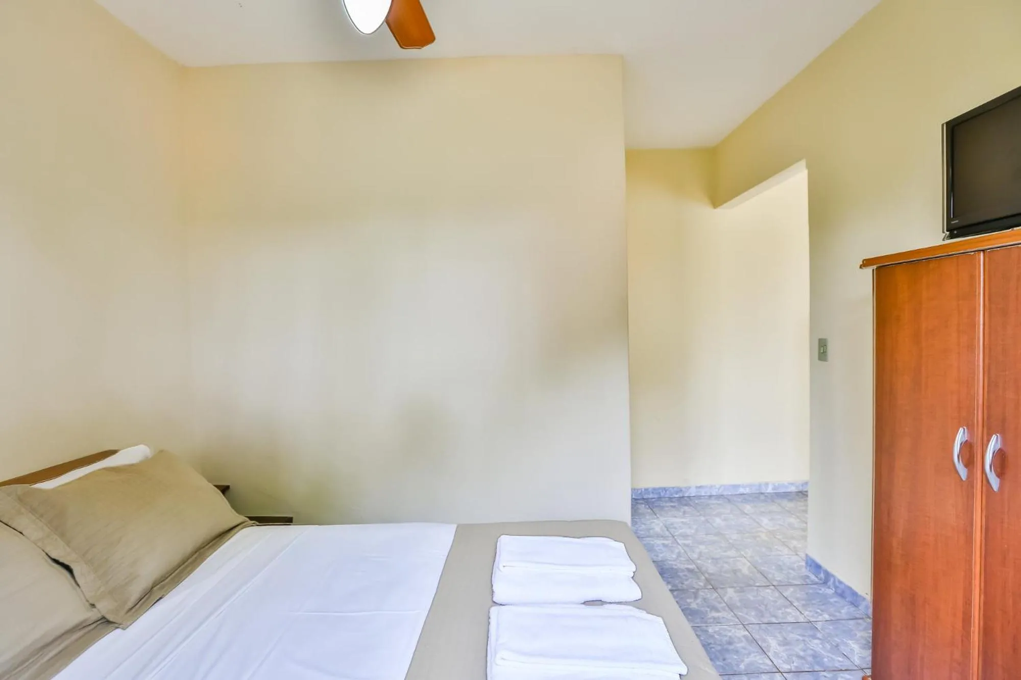Bed in Pousada Recanto do Amanhecer