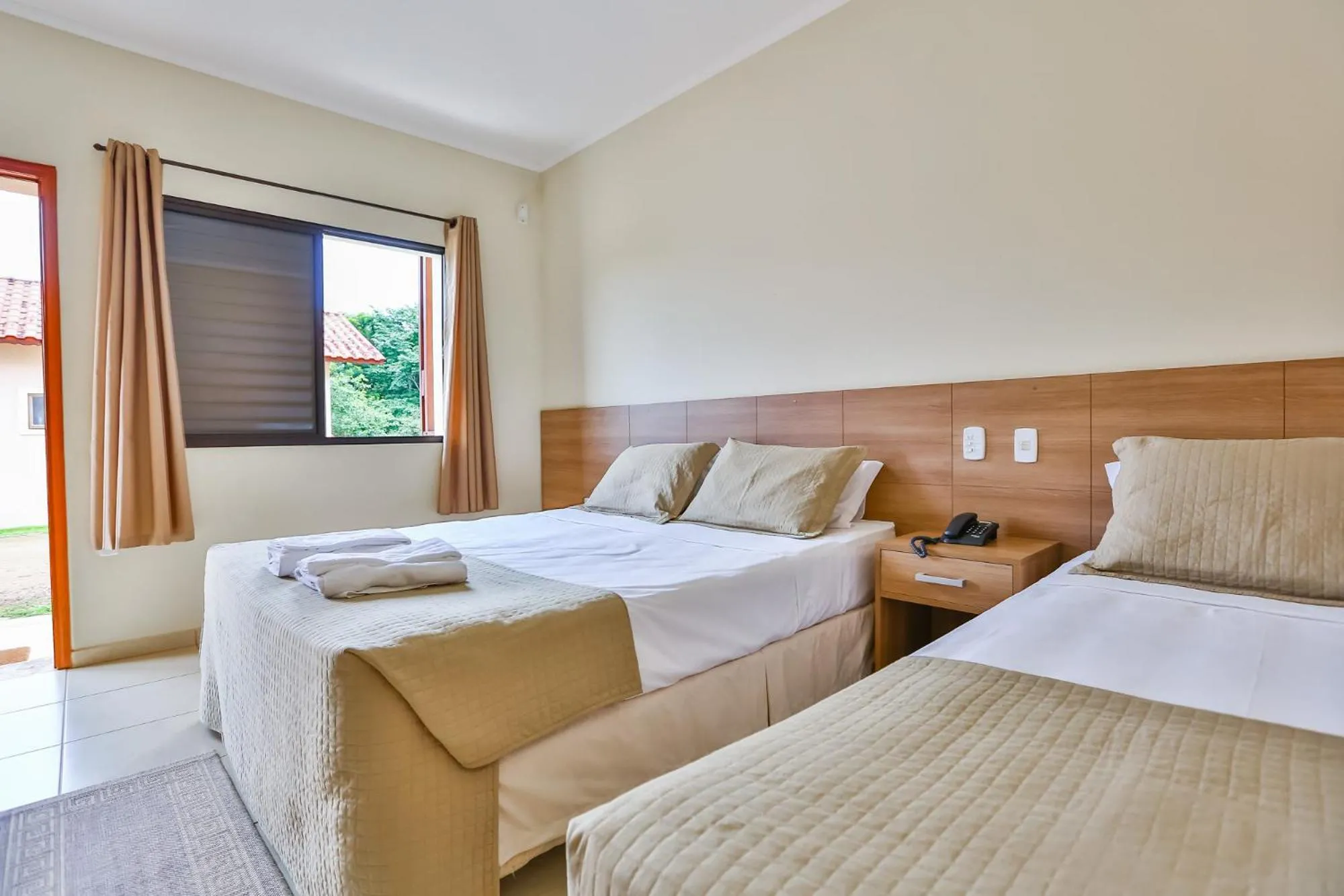 Bed in Pousada Recanto do Amanhecer