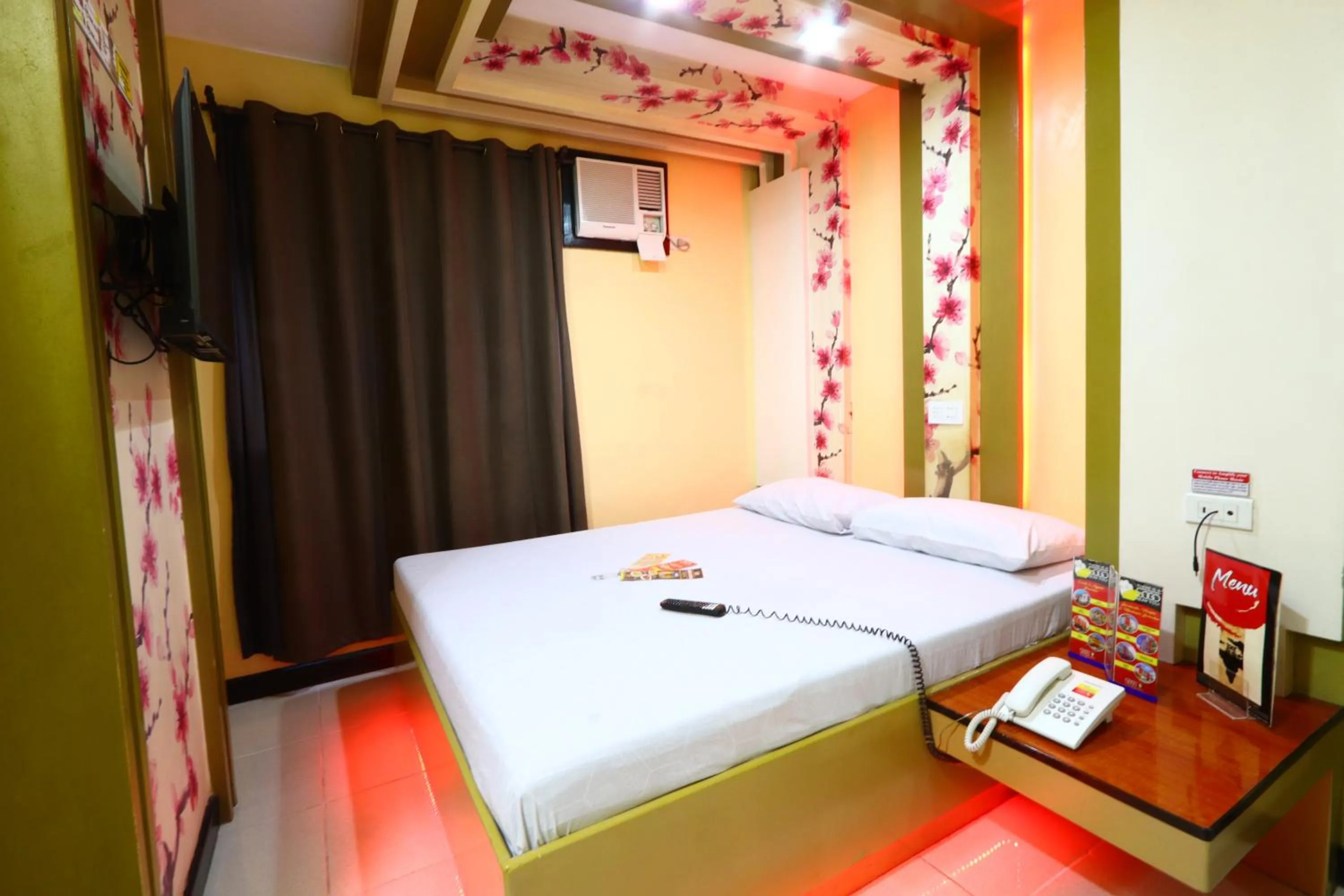 Bedroom, Bed in Hotel Sogo Banawe