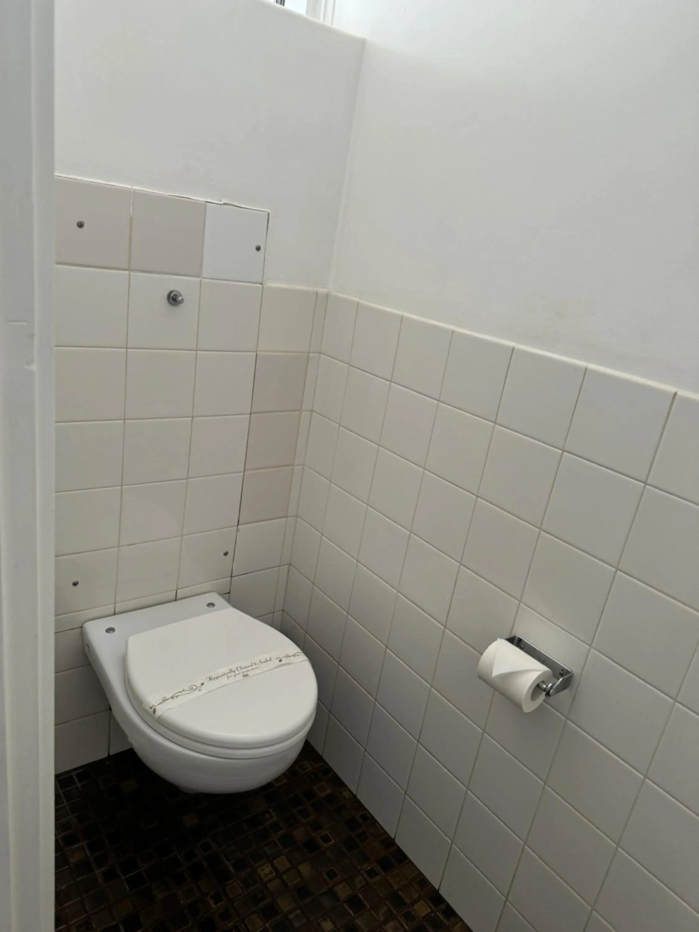 Toilet in Mid City Plantation Motel