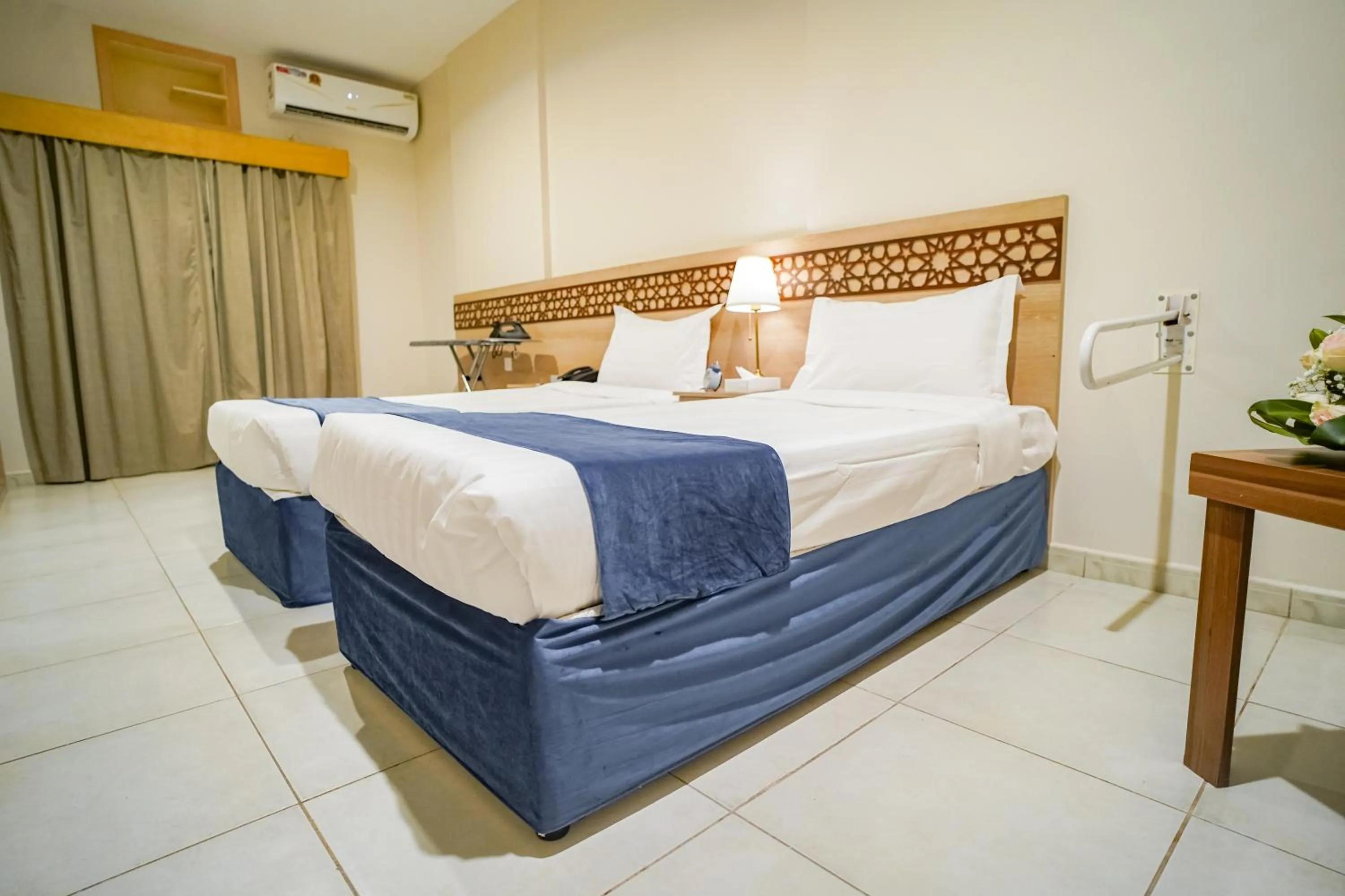 Bed in Osturat Emaar Hotel