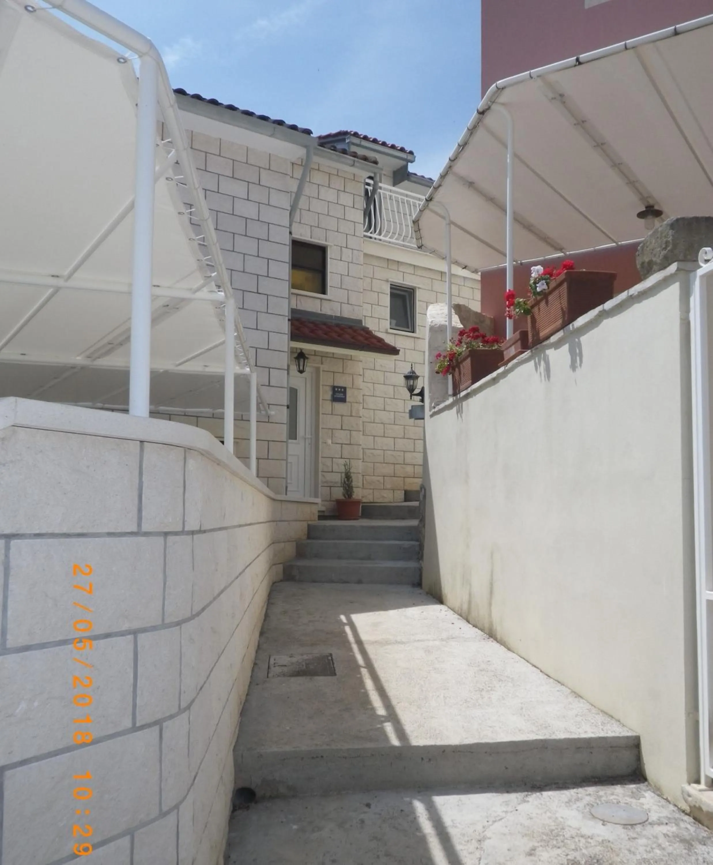 Property building in Apartments Siri, 1 min walk to the beach